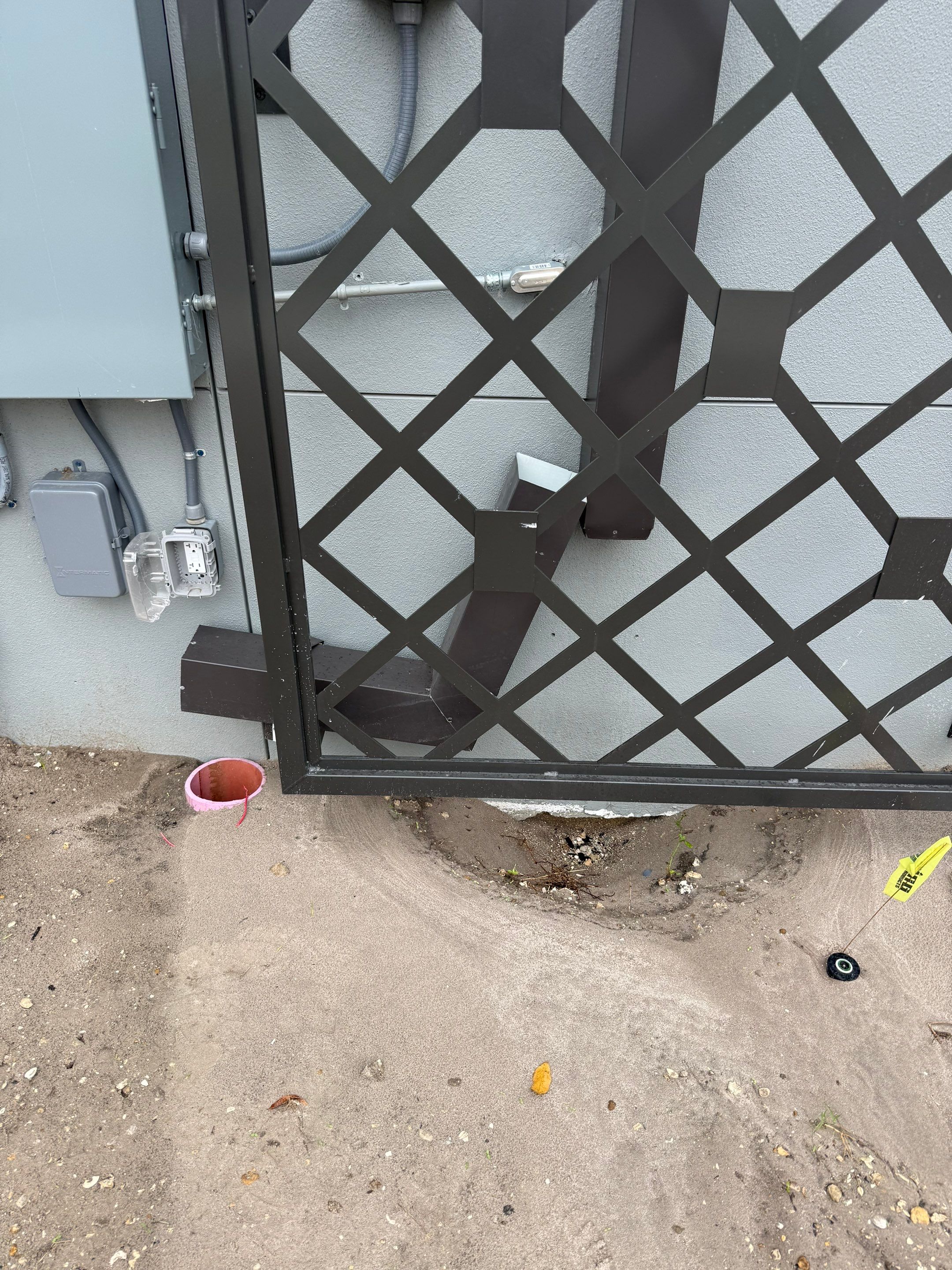 Downspout Installation using collector head in Cape Coral FL by Gutter Professors