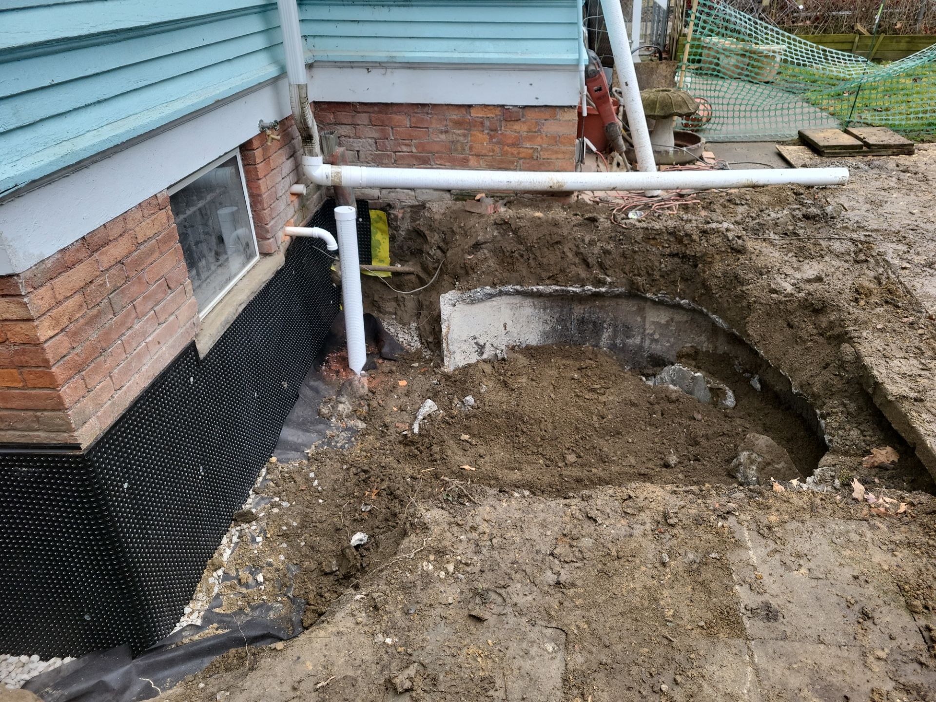 Exterior Basement Waterproofing & Combo Sump Backup System by Toledo Basement Repair