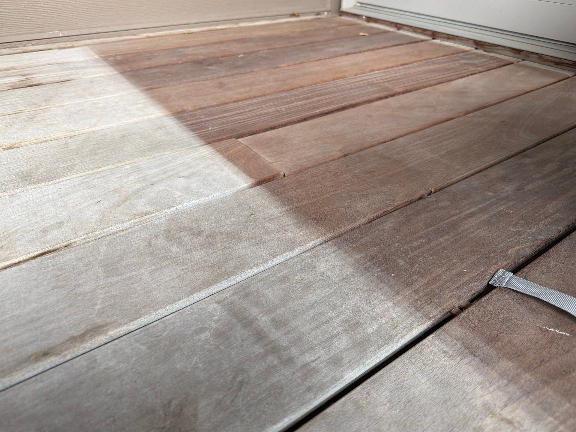 Deck Staining and Tongue and Groove Ceiling Refinish in Sioux Falls by Select Painting, Coatings & Garage Cabinets