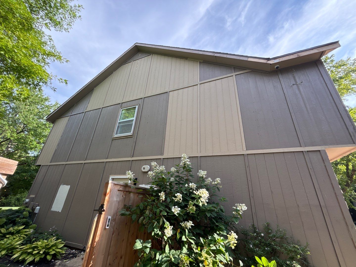 Shoji White Exterior Painting and Comprehensive Wood Rot Repair in Overland Park by Cougar Painting