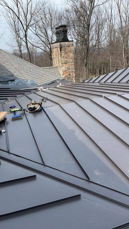 Standing Seam Metal Roof using Aluminum 032GA - Color Dark Bronze by CMNG LLC