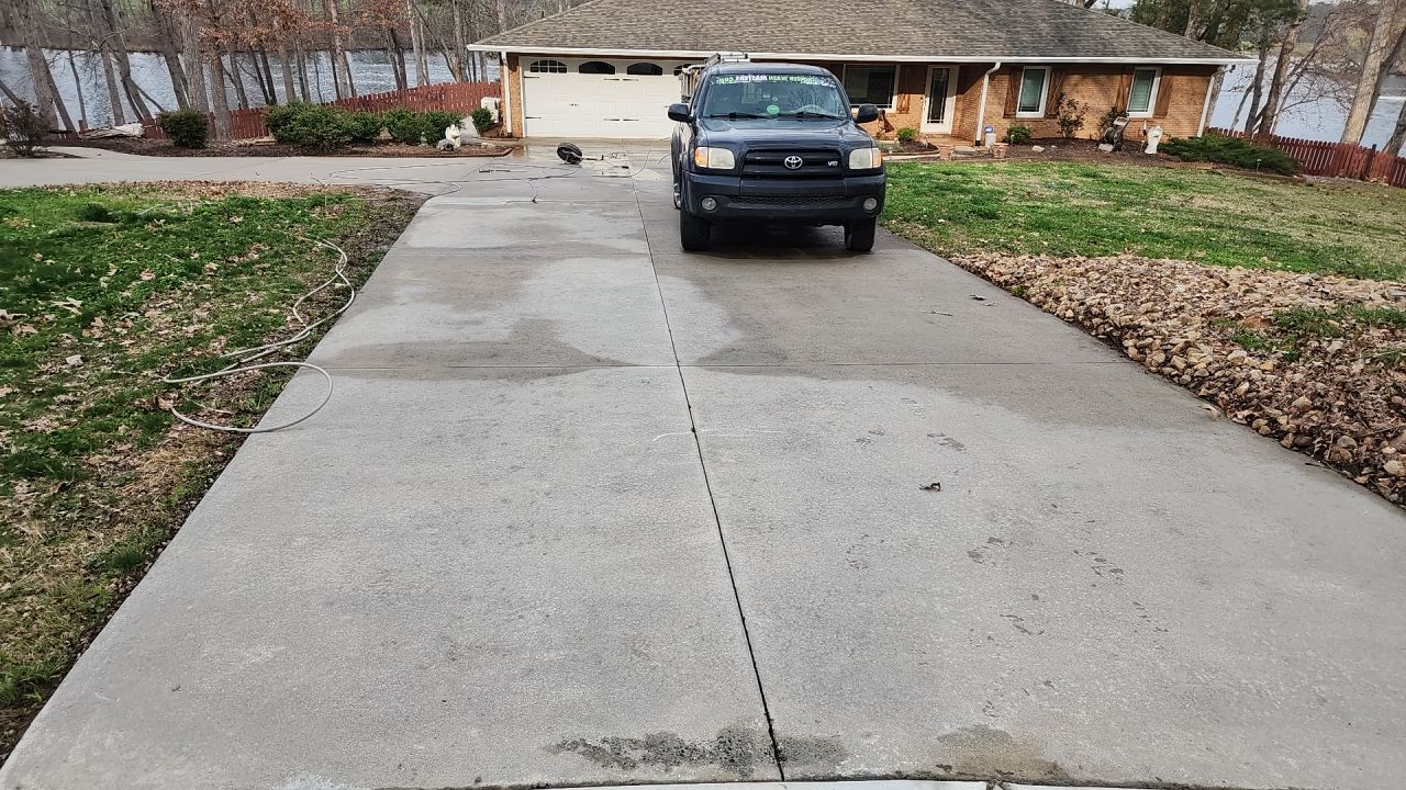 House Wash using cleaner by Power Wash Masters LLC