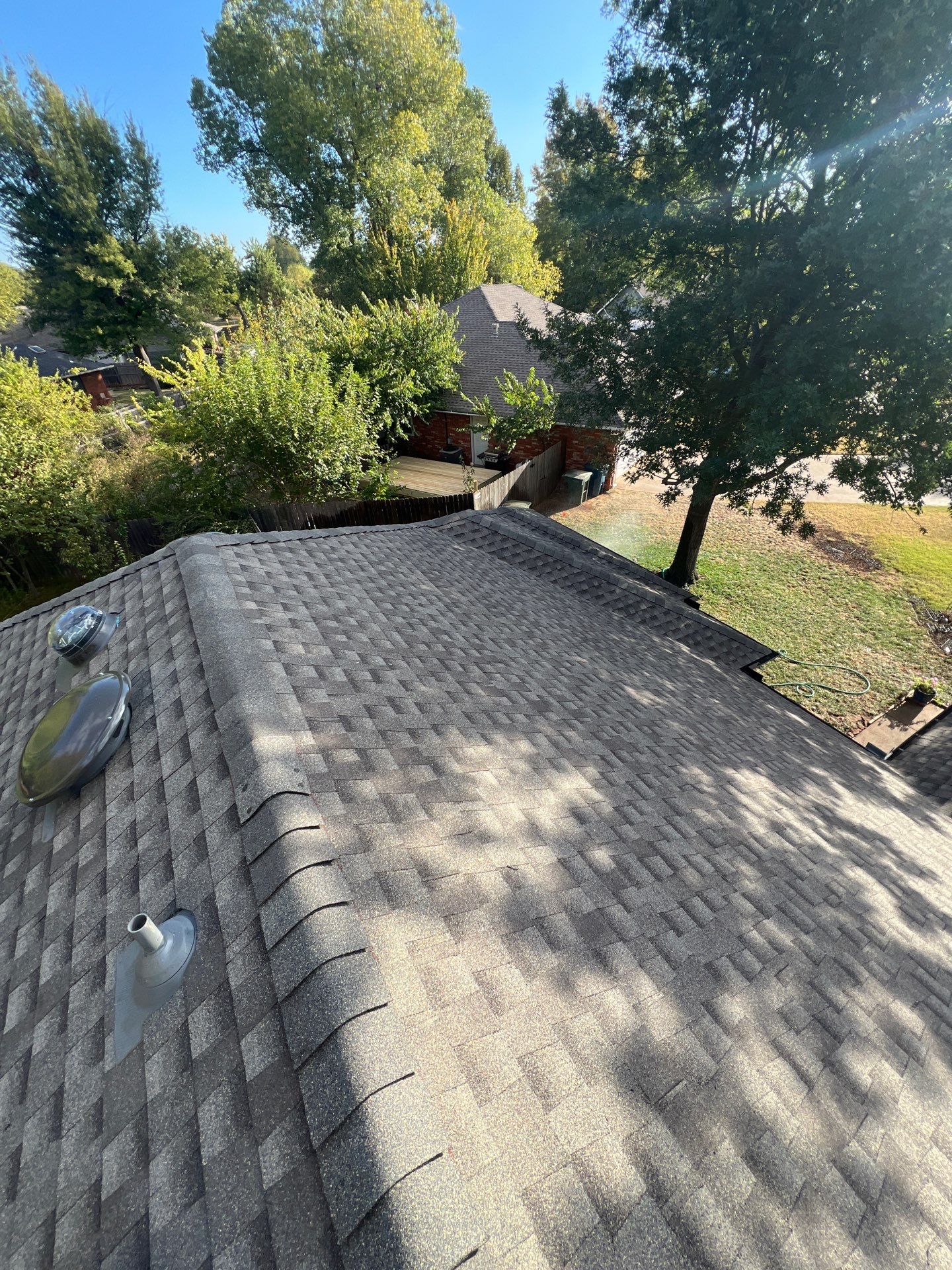 Roof Replacement and Sun Tunnel Installation in Edmond, OK by McCann's Roofing and Construction