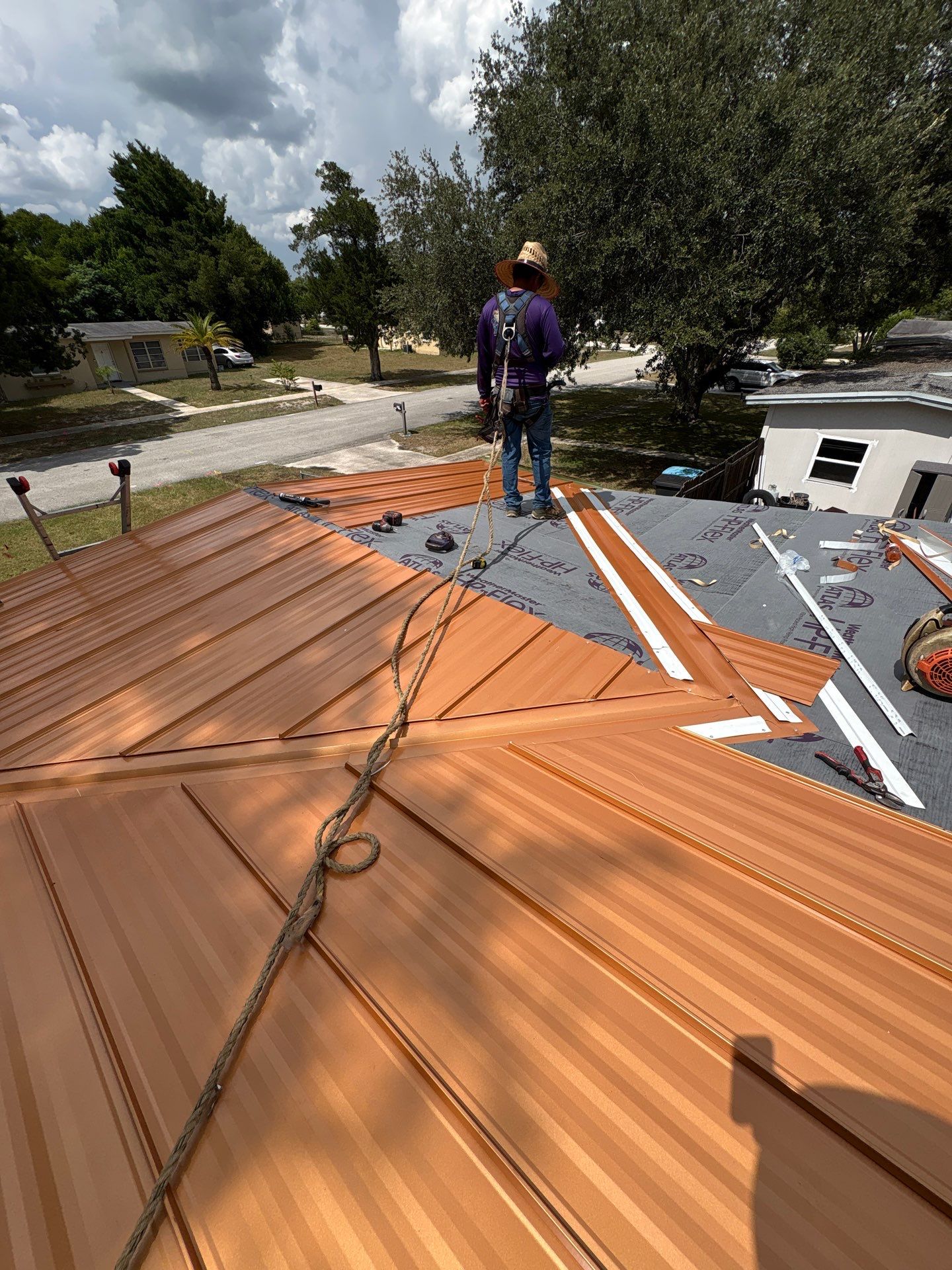 Standing Seam Metallic Copper Metal Roof Replacement in Deltona by Pinnacle Roofing Group