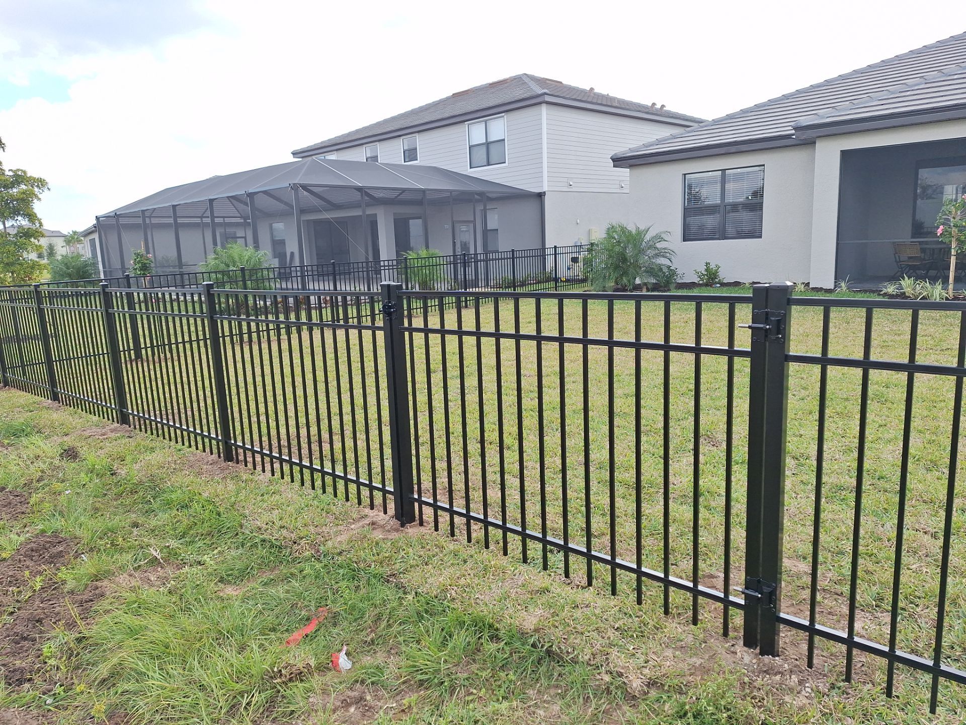 Aluminum Fence Installation using 4ft 3 Rail Black Aluminum Fence by Asap fence and gates, LLC
