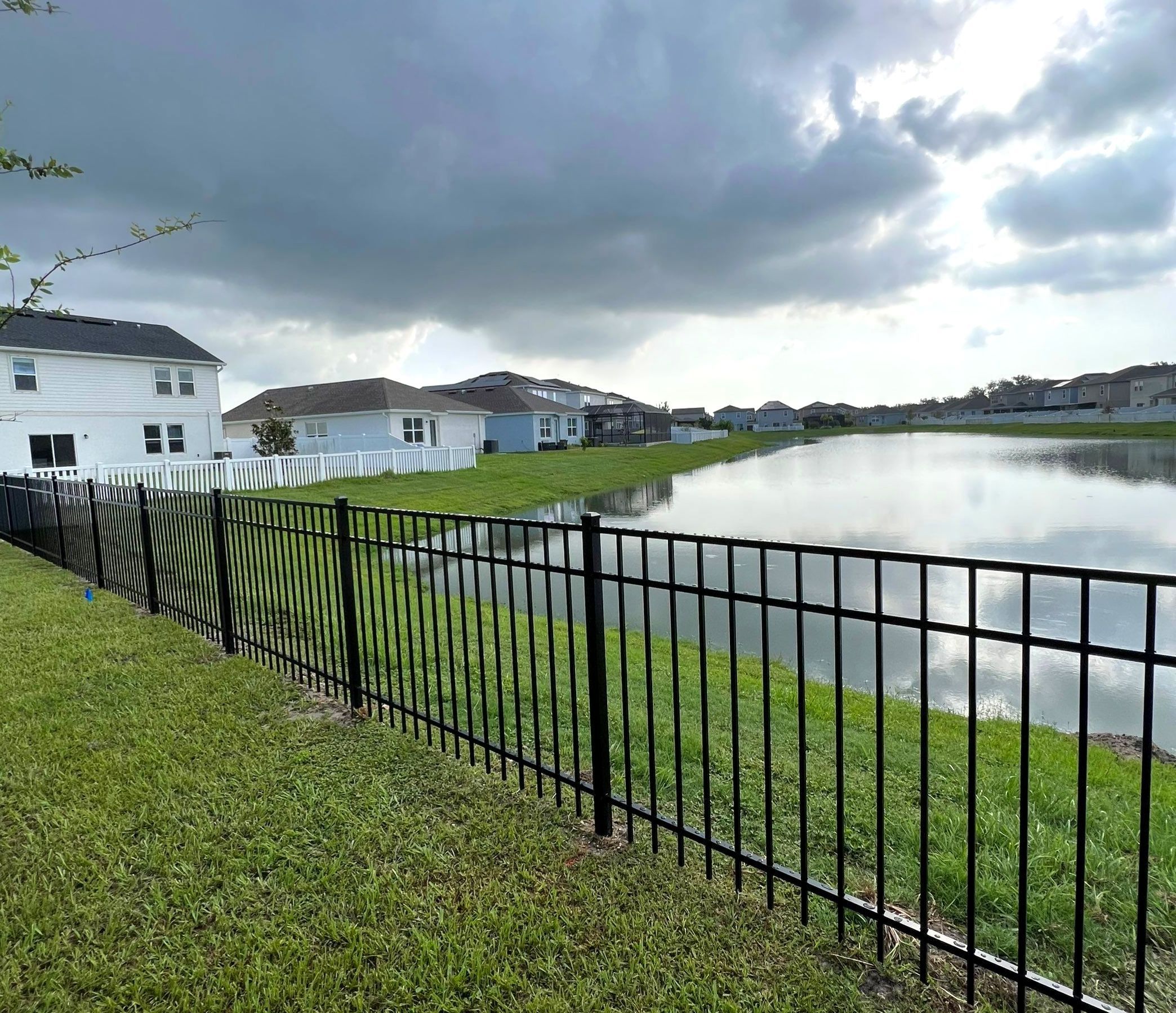 Aluminum Fence Installation using Black 3 Rail Aluminum Fence by Asap fence and gates, LLC