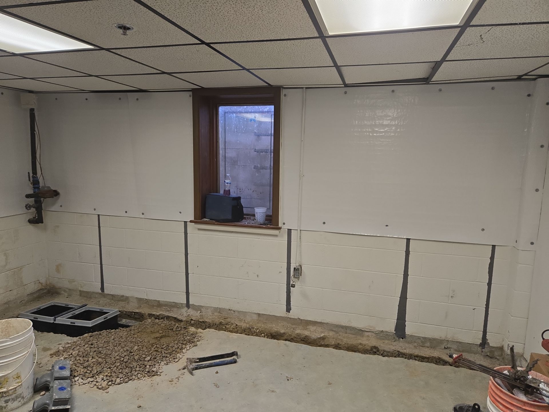 Interior Basement Waterproofing System with Embedded Fiber Reinforcement by Toledo Basement Repair 