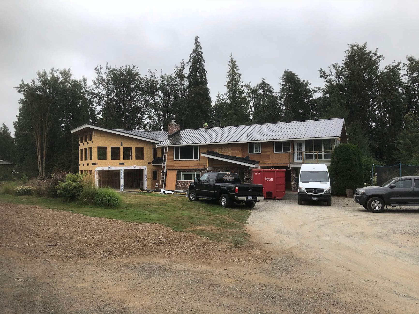 Residential Roofing Installation using 12" Prolok metal  by Top Notch Roofing Inc