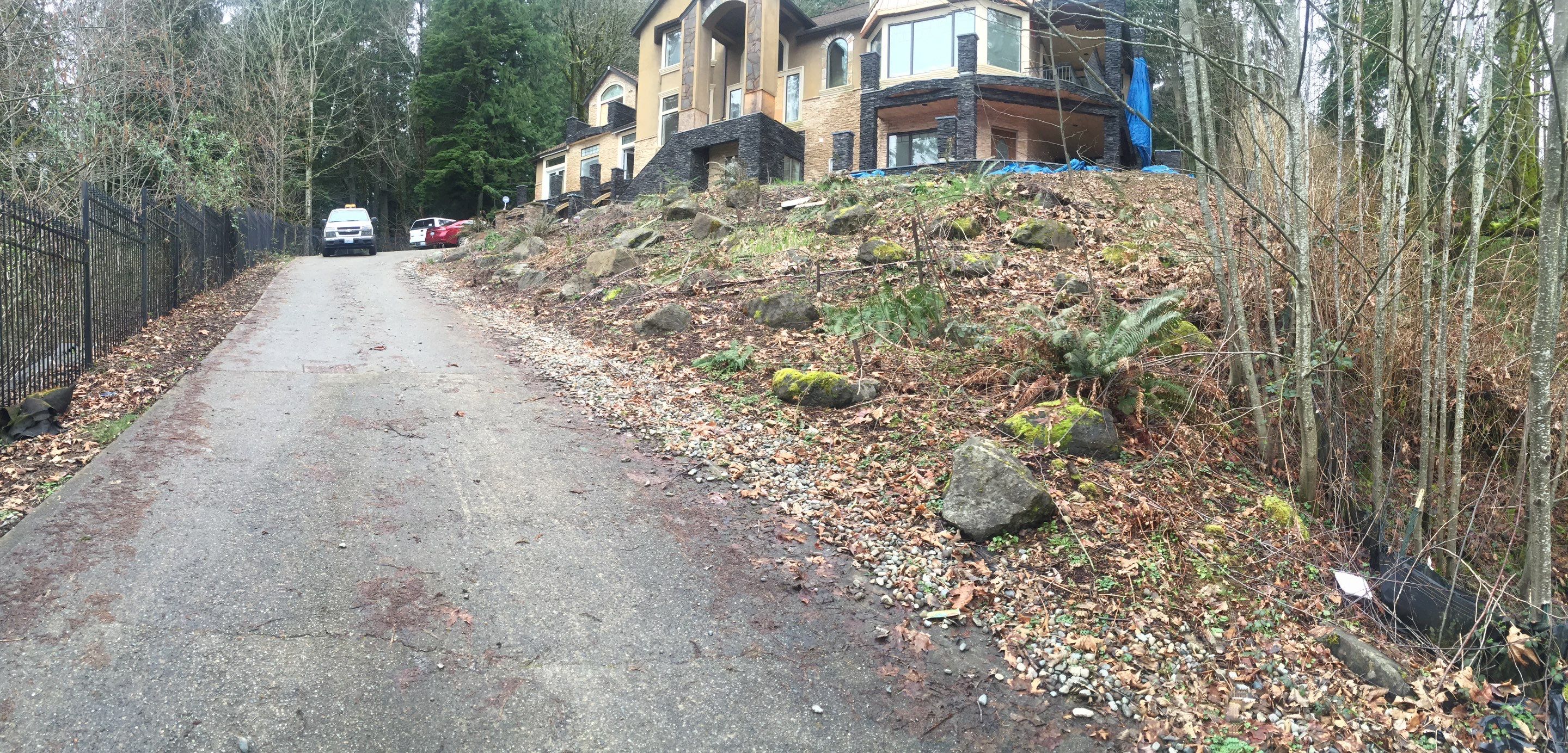 Asphalt Driveway and Stamped Concrete Patio Finish  by Jireh Asphalt & Concrete Inc 