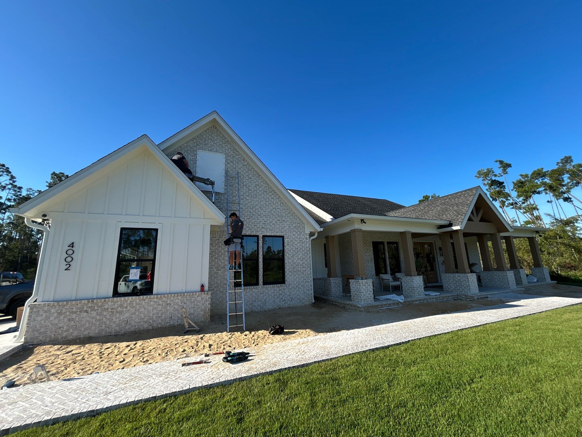 Custom Hurricane Fabric Storm Shutter Installation in Panama City by Brannan Aluminum Inc.