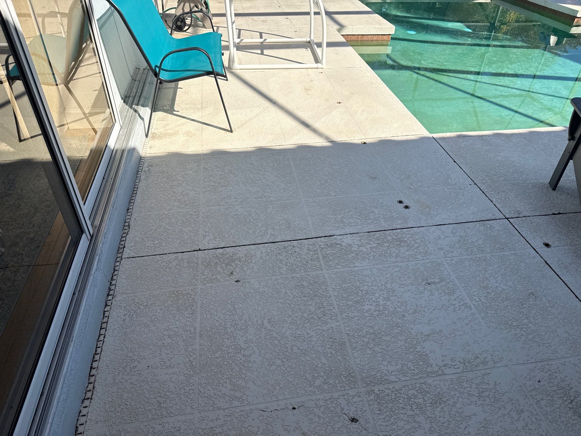 Painted Pool Deck, Lanai & Pool Cage Cleaning in River Club South – Bradenton, FL by Sunshine AquaWash