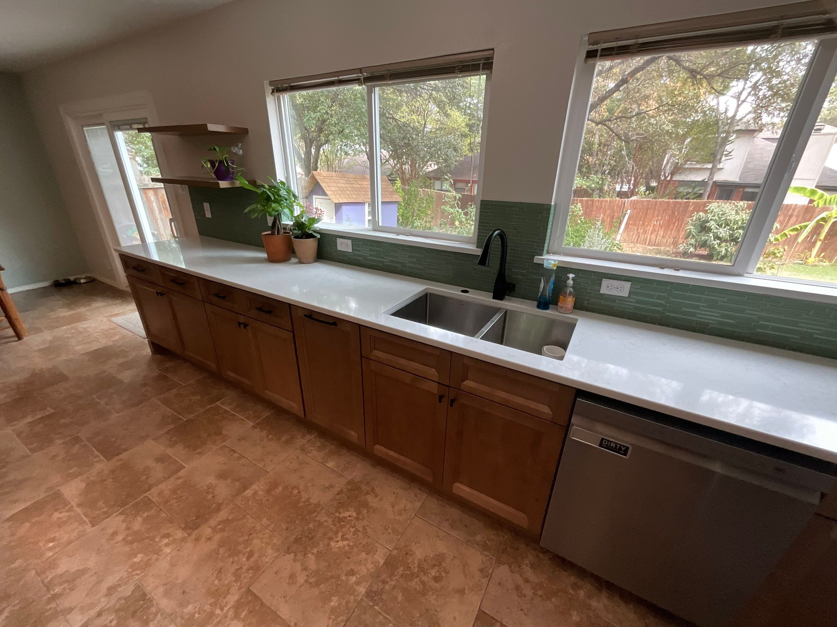 Northwest San Antonio Kitchen Remodel | Warm Modern Kitchen Transformation Featuring Green Backsplash by Legacy Bath and Kitchen 