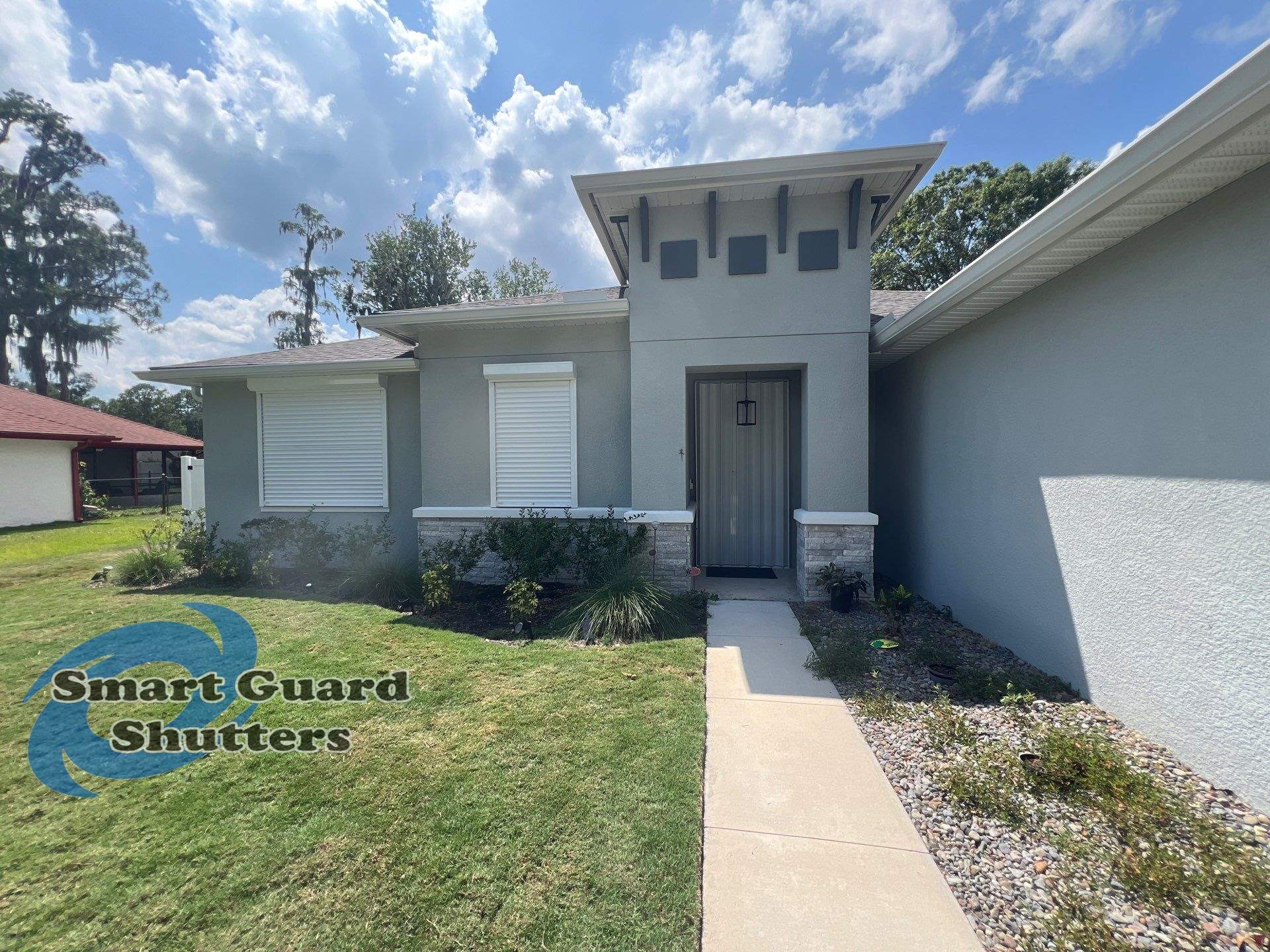 Hurricane Protection using Accordions & Rolling shutters by Smart Guard Shutters