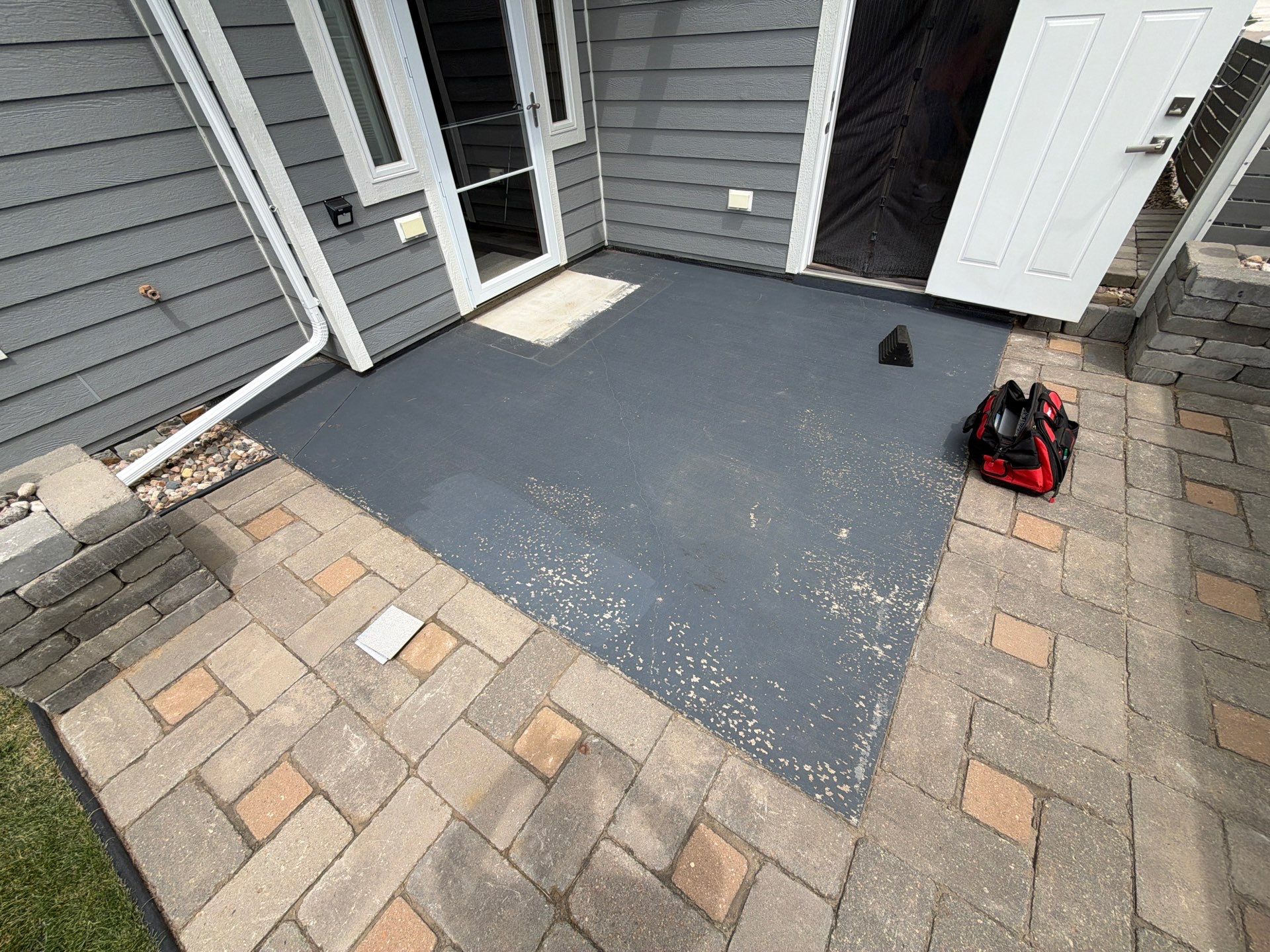Concrete Patio Coating with Fuzzy Wool Finish in Sioux Falls by Select Painting, Coatings & Garage Cabinets