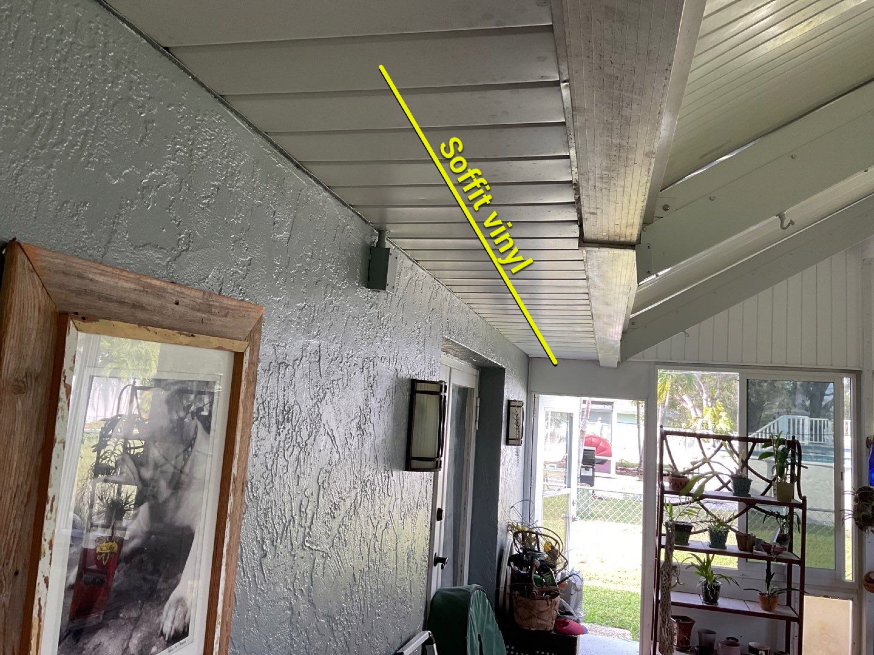 Soffit and Fascia Installation using White Vinyl Soffit in Cape Coral FL by Gutter Professors
