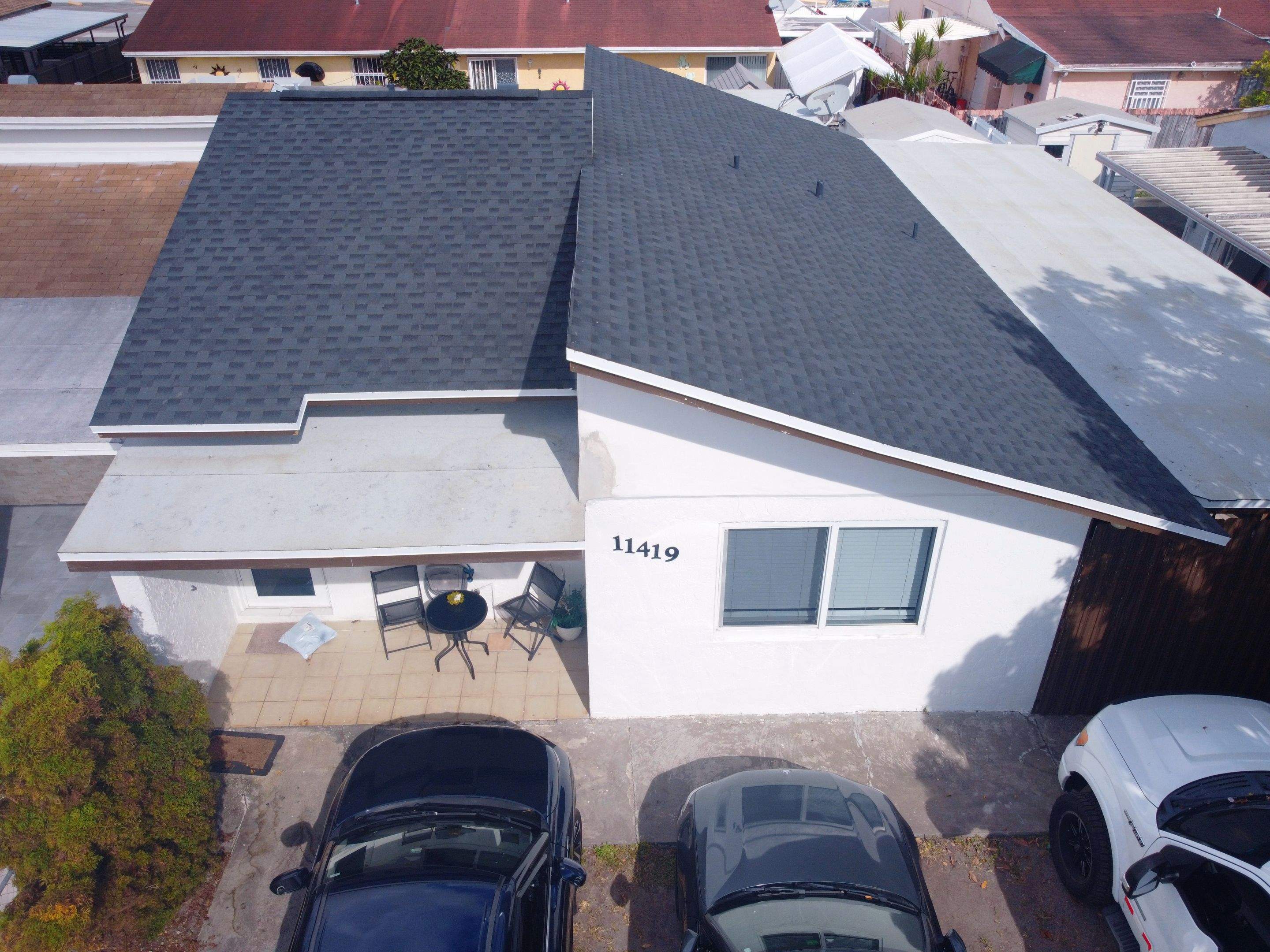 shingle roof  by City Roofing Inc