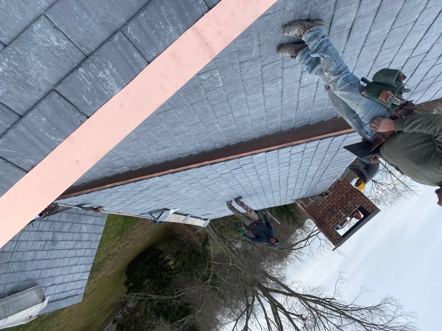 Residential Roofing Installation using Vermont Slate by A Plus Exterior