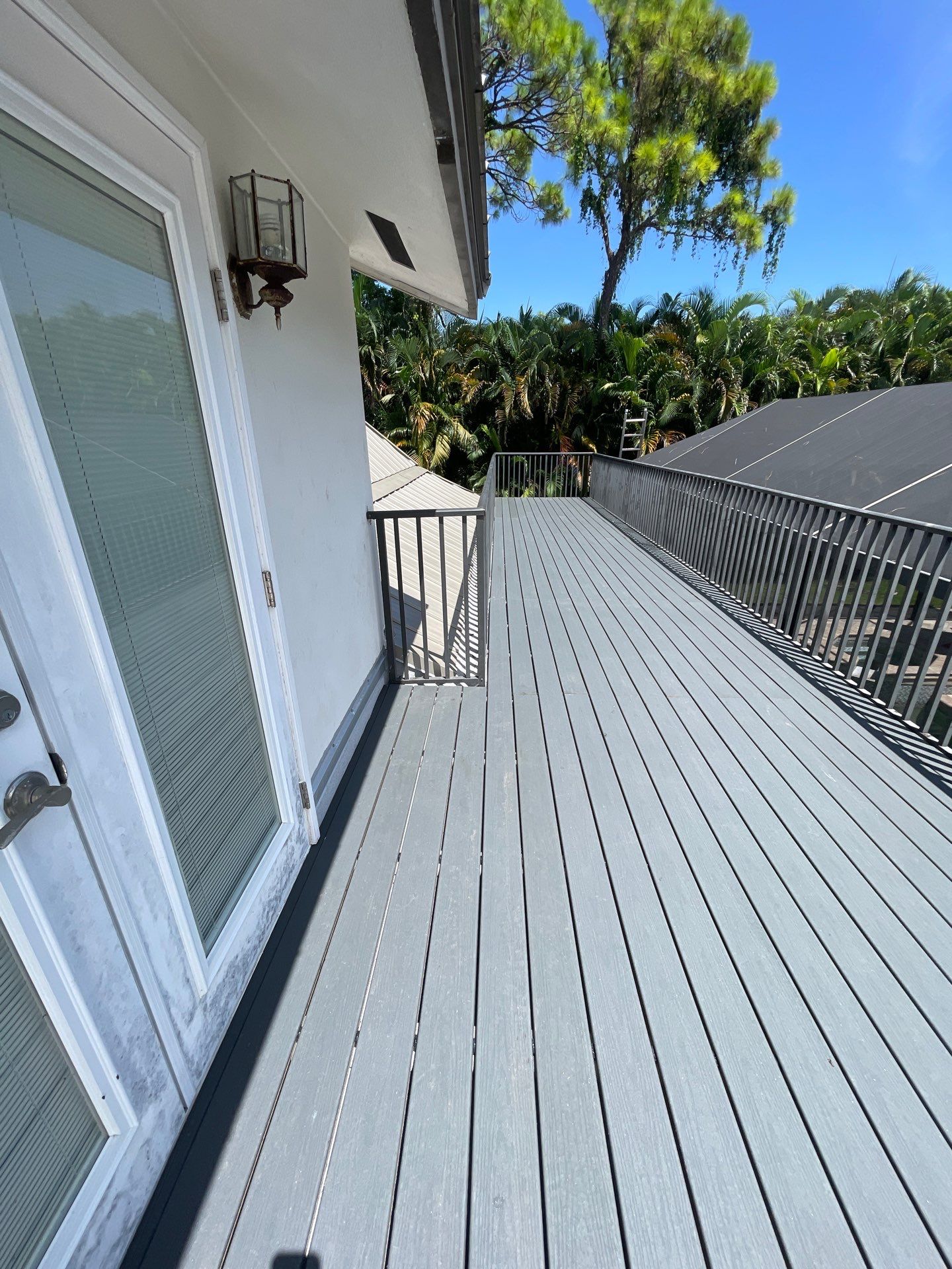 TPO Membrane- Trex Deck in Clam Shell color Balcony by Durabilis Roofing INC