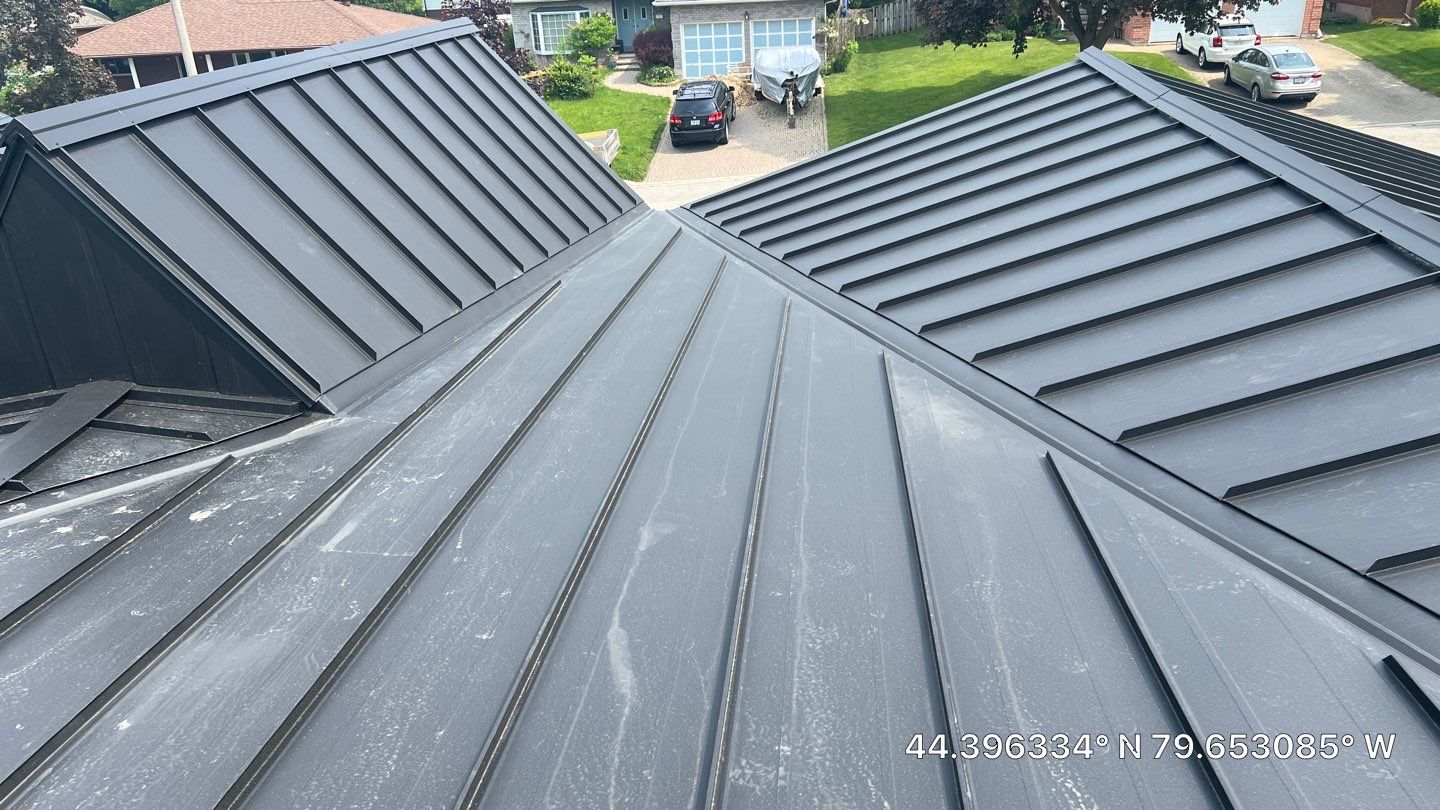 Residential Roofing Installation using 16" Standing Seam Panels by Jay Carter Roofing & Sheet Metal