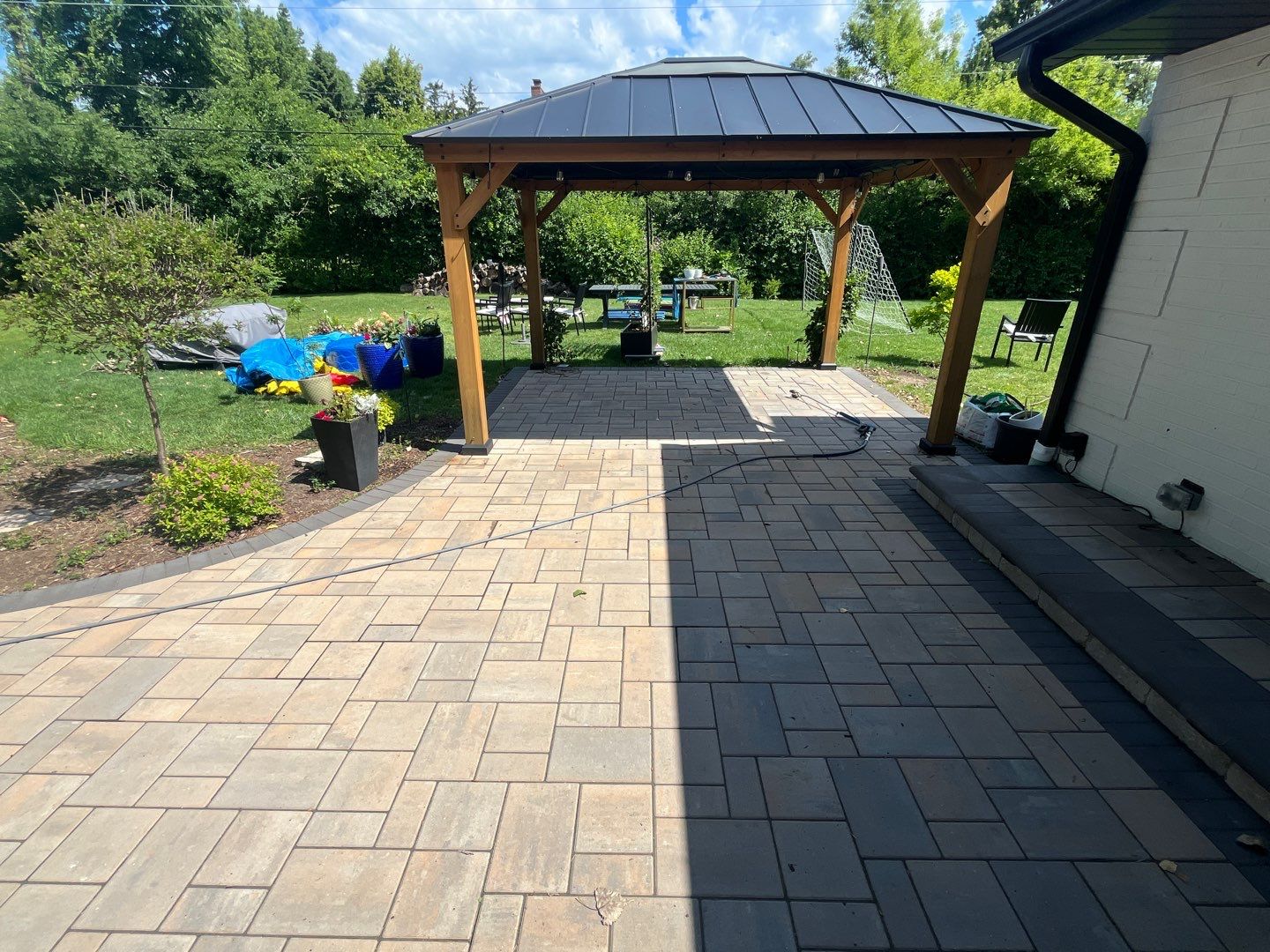 Brick paver repair, cleaning and sealing by Northern Power Washing LLC.