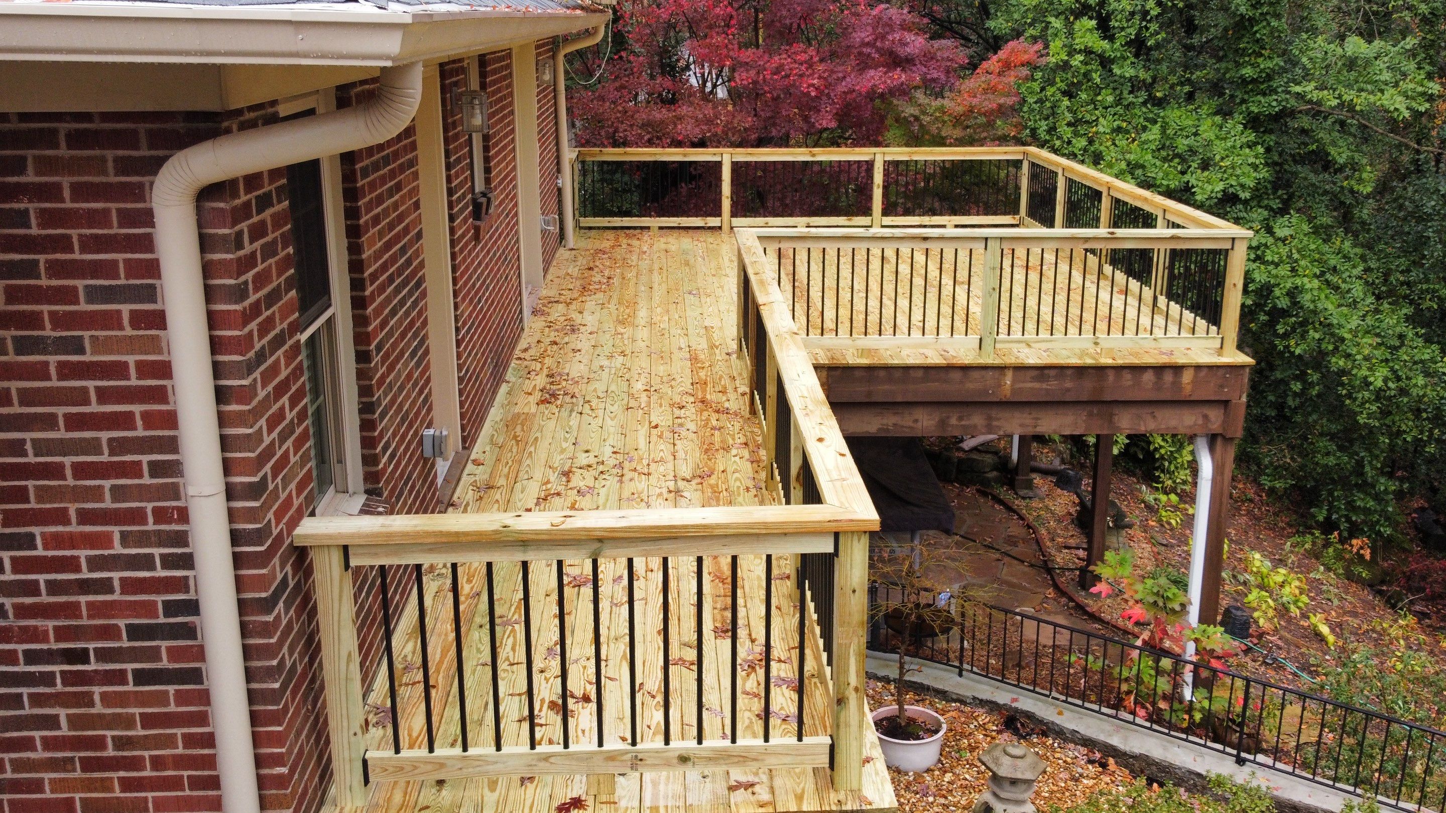 Pressure-Treated Wood Deck Replacement and Garden Bridge in Atlanta by Swift Home Renovations