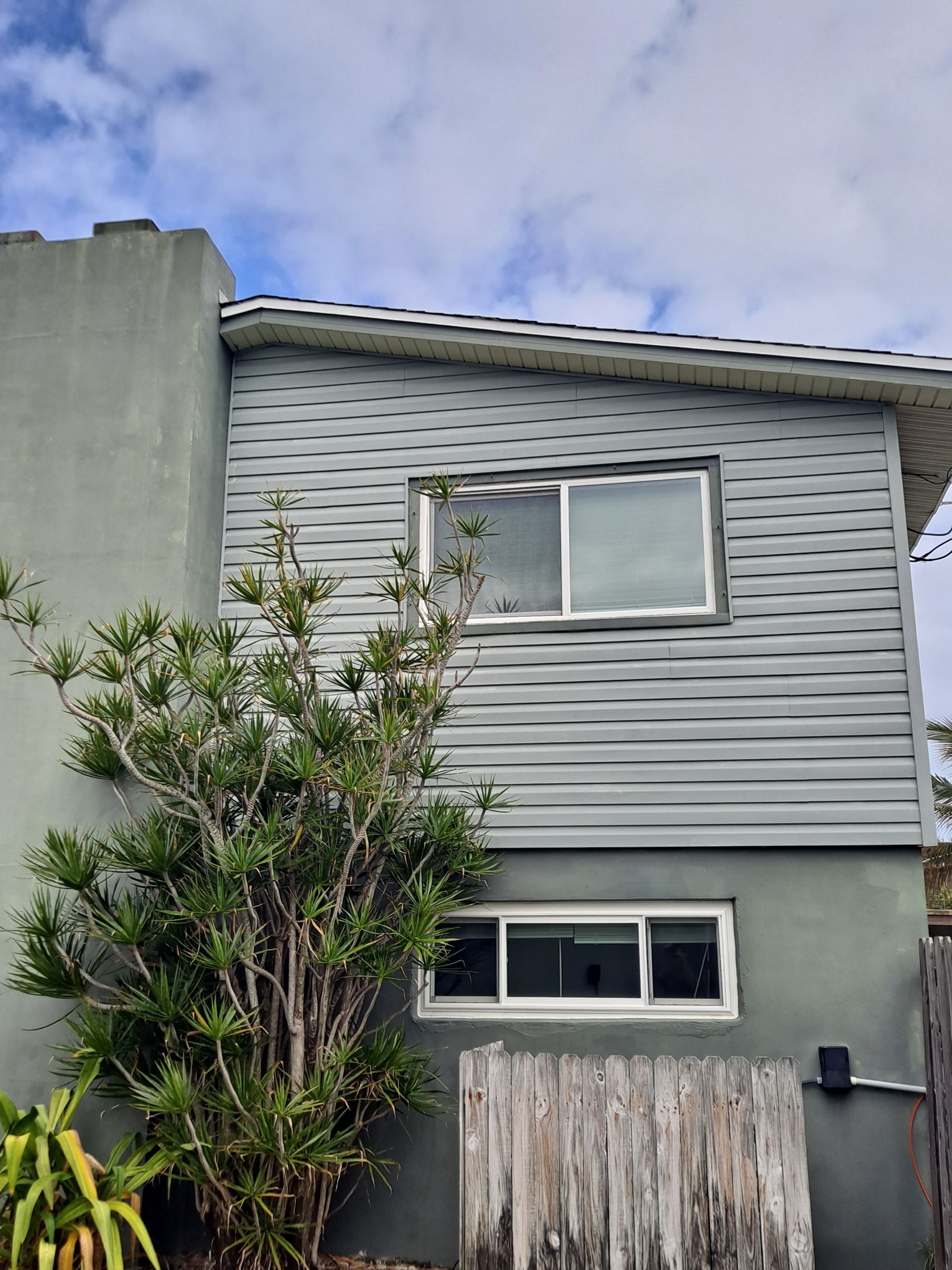 Vinyl Siding Replacement and Exterior Renovation in Satellite Beach by Florida Roofing and Renovations Inc.