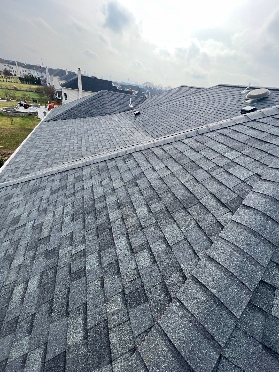 Estate Gray Shingles by Reimagine Roofing