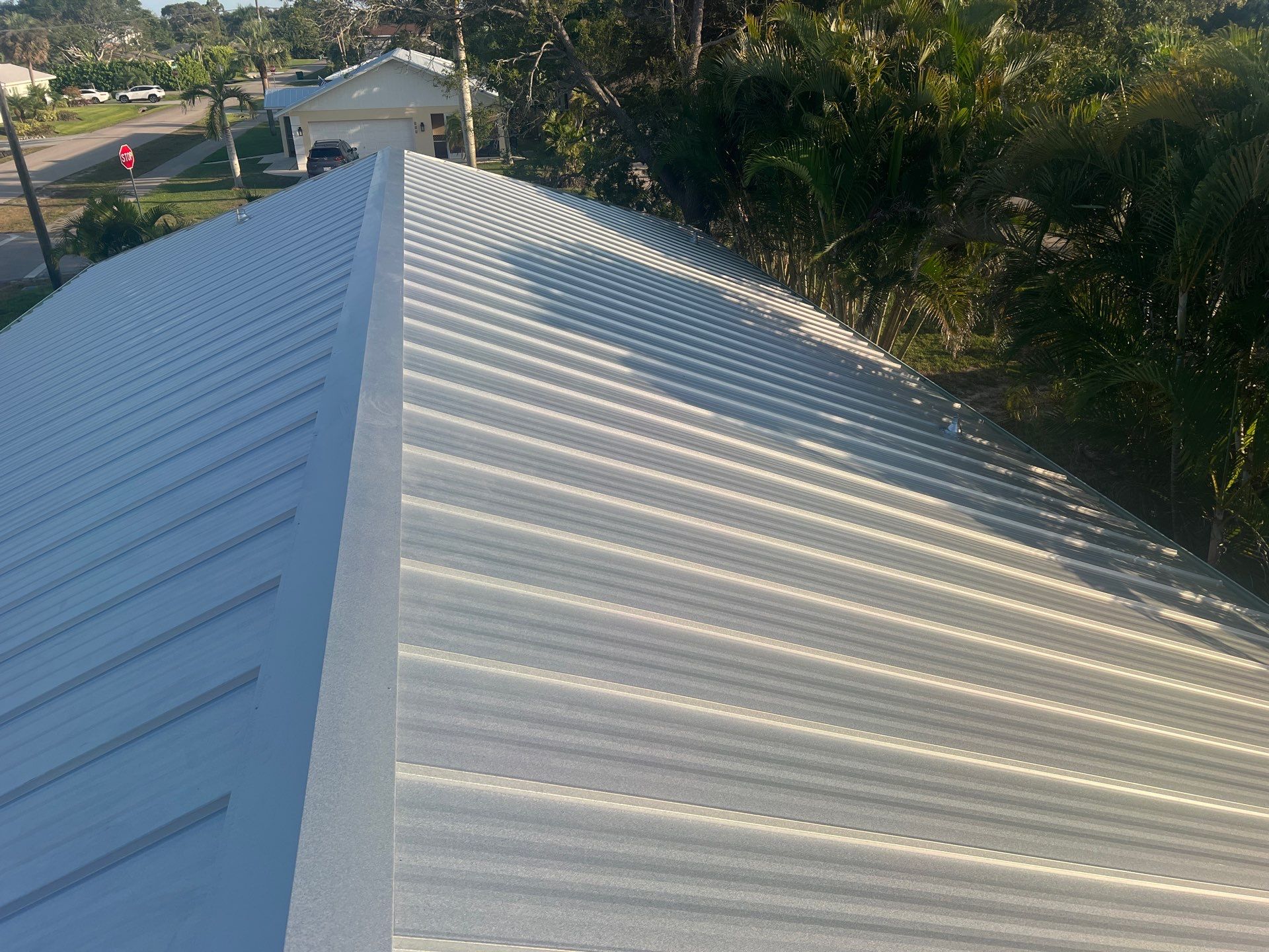 Residential Roofing Installation using Galvalume Standing Seam by Durabilis Roofing INC