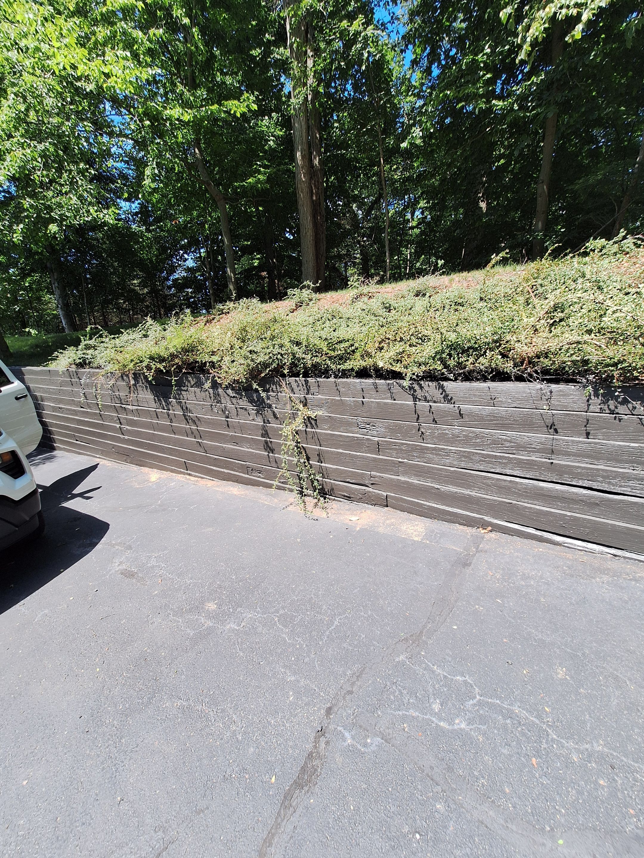Exterior Retaining Wall Painting | Grand Haven, Michigan by Gordon Painting