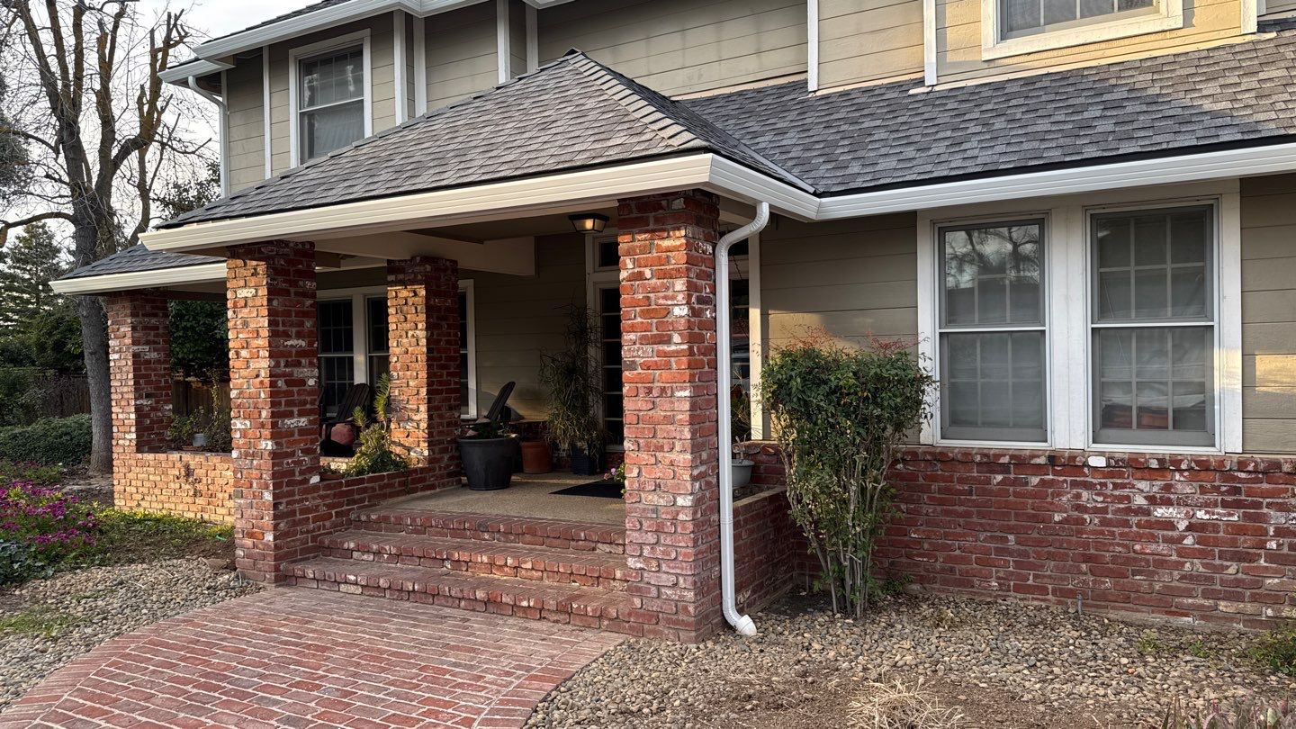 New shingles and gutters using GAF Timberline HDZ shingles and aluminum gutter by Straight Edge Roofing Inc