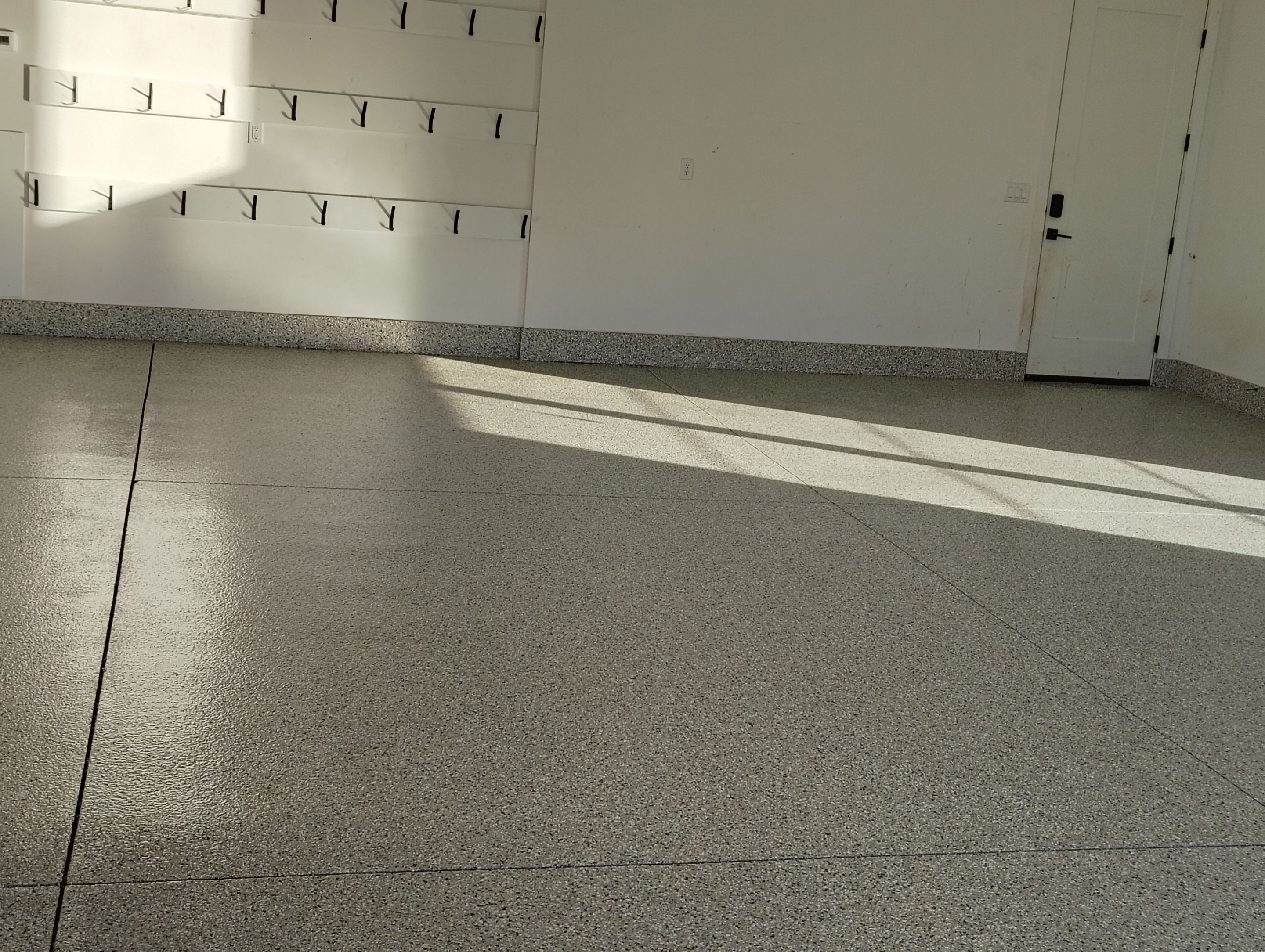 Epoxy Flake Garage Floor and Stair Coating in Sioux Falls by Select Painting, Coatings & Garage Cabinets