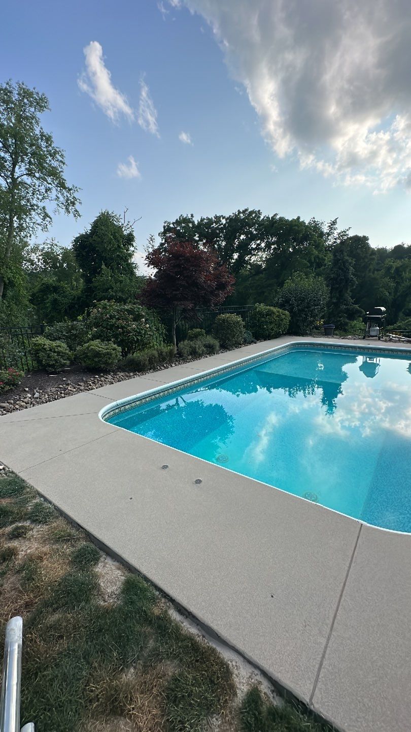Pool Deck + Driveway + Garage Project in Venetia by Floors in a Day, Inc