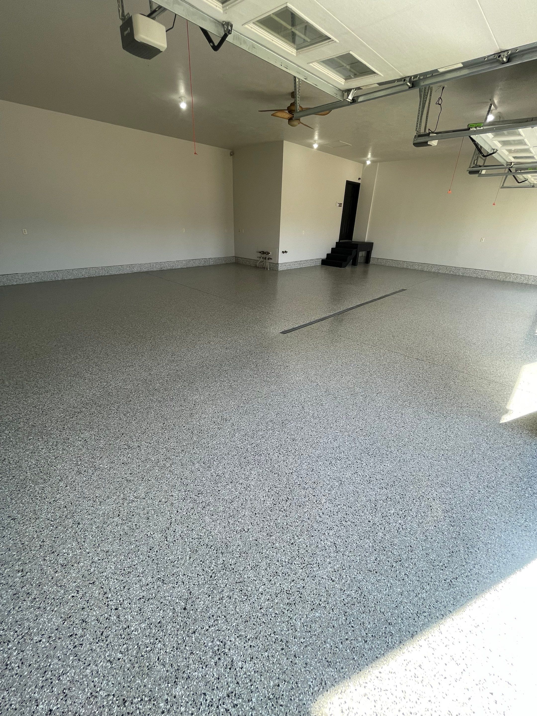 Multi-Car Garage Epoxy Floor Coating in Beresford by Select Painting, Coatings & Garage Cabinets