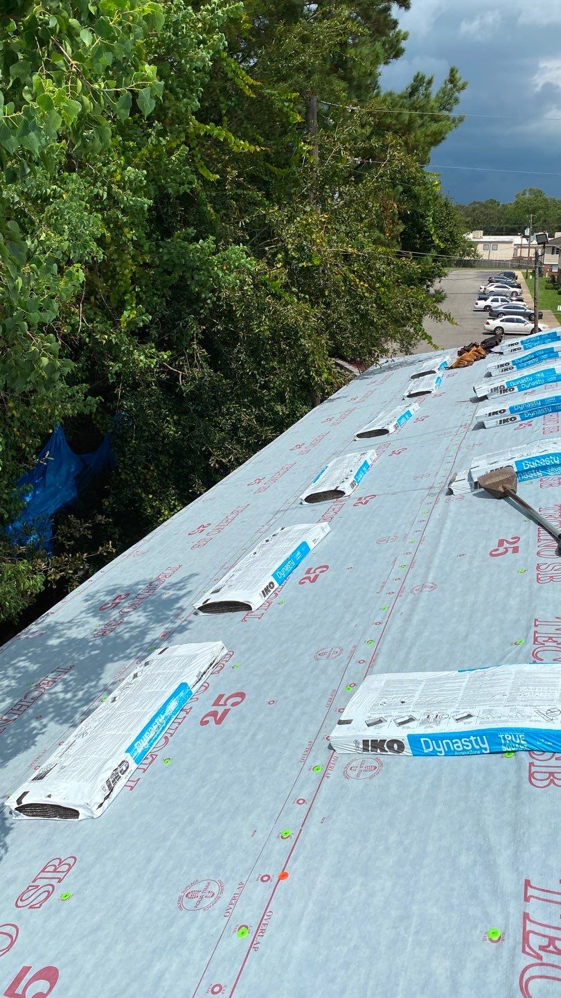 Commercial Roofing Installation using Roof Replacement by American Roofing & Construction LLC