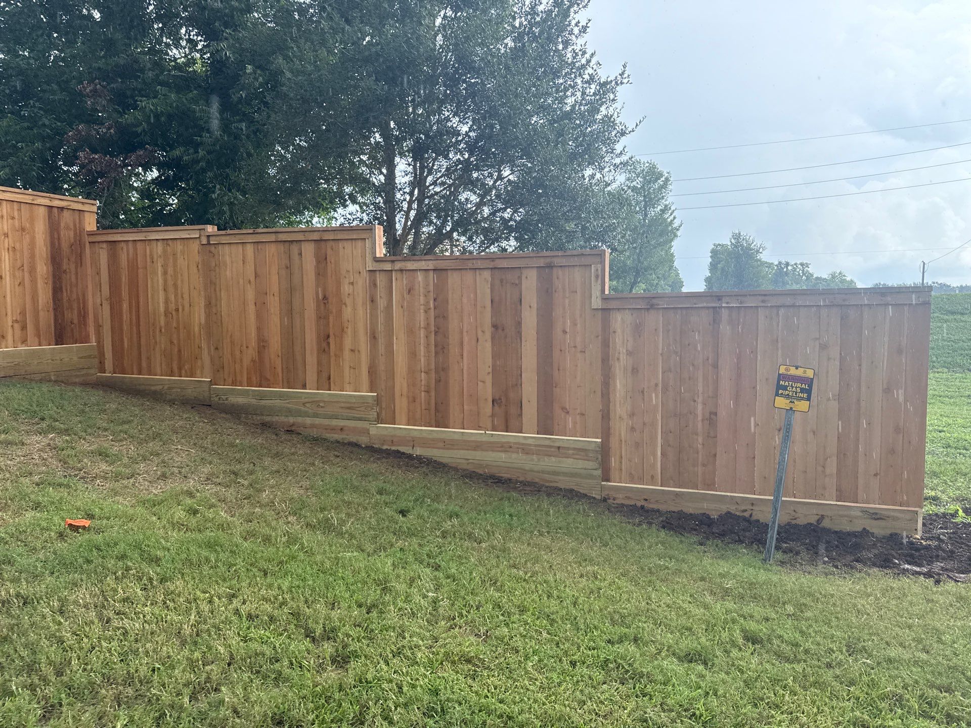 Wood Fence Installation for HOA by Tim's Fences