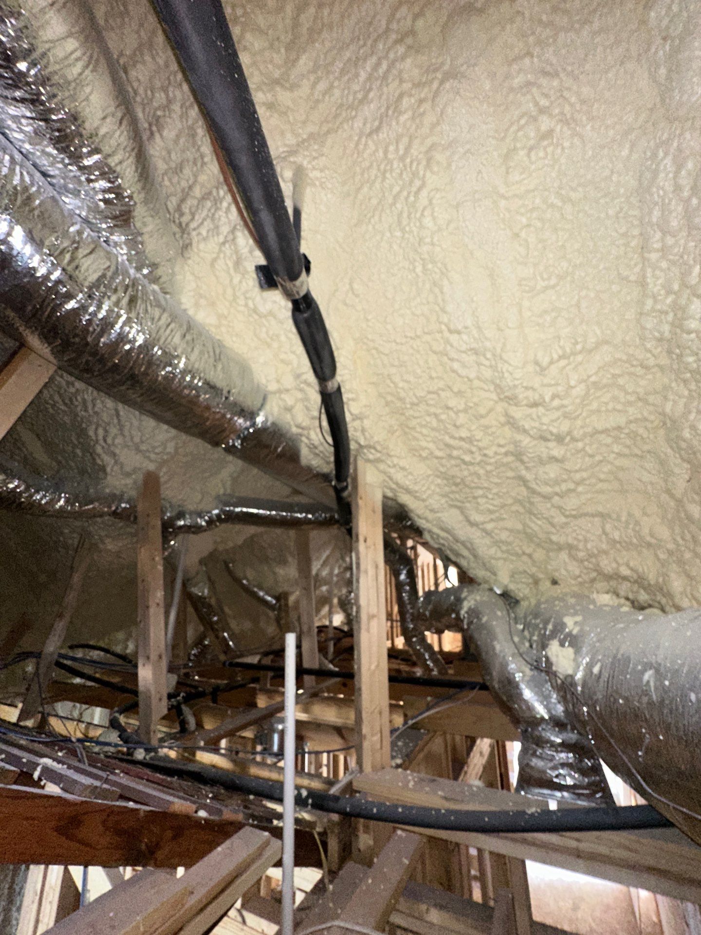 Full encapsulation with open cell spray foam on this custom home in Dallas by Apex Insulation Solutions