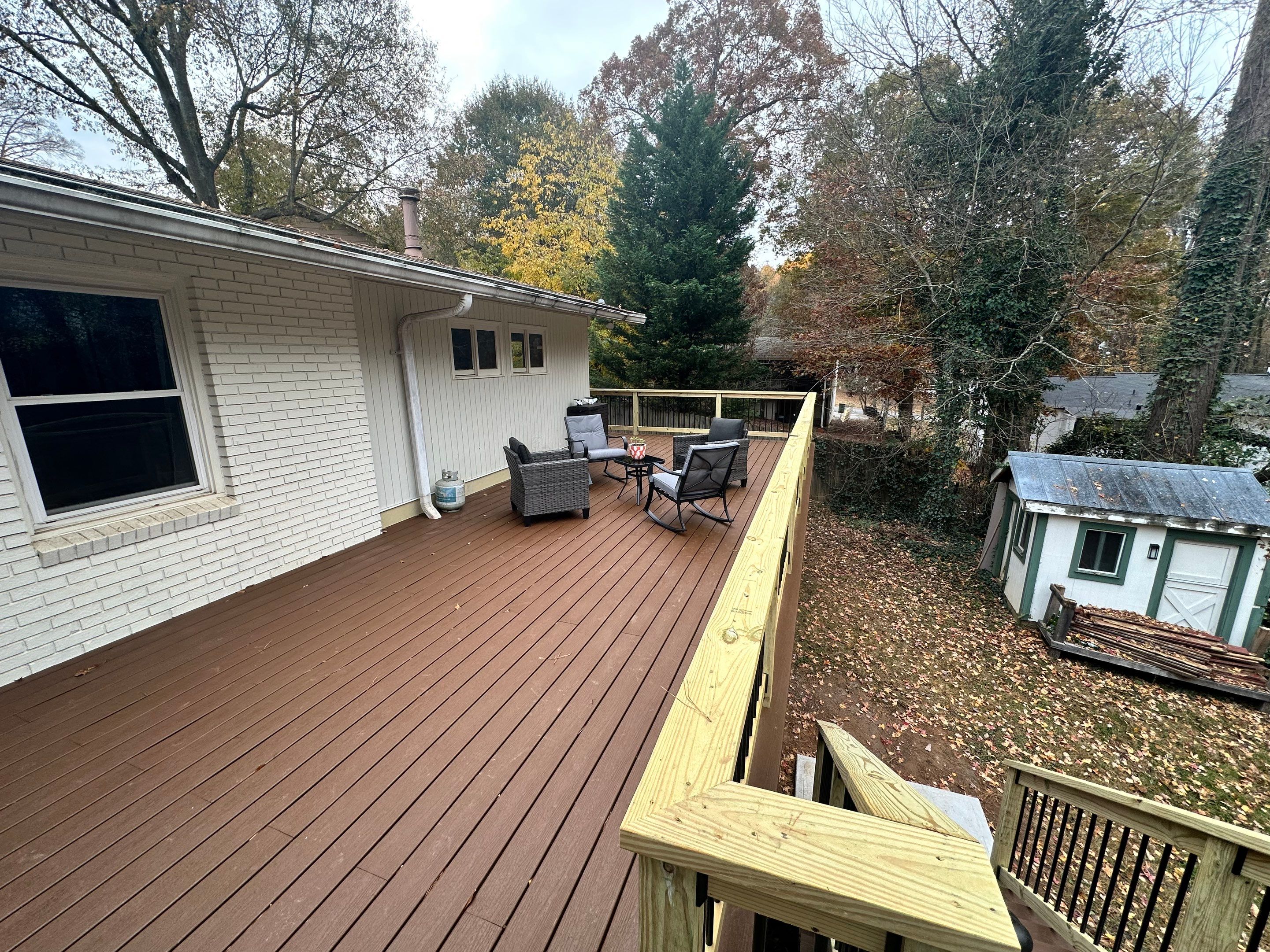 Elevated Composite Deck Rebuild With Metal Balusters in Marietta by Swift Home Renovations