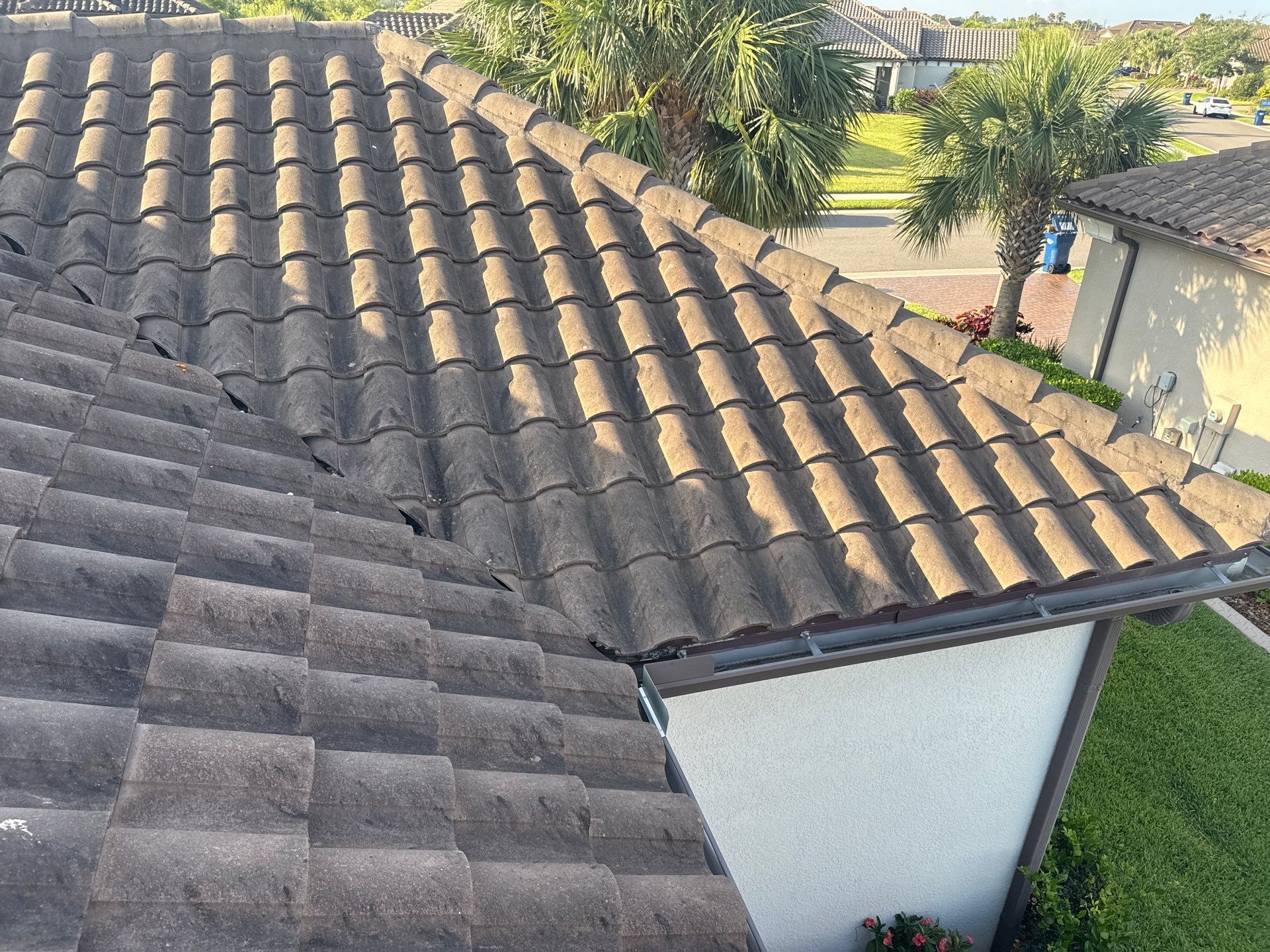 Soft Wash Roof Cleaning – Concrete Tile Roof | Artisan Lakes Esplanade, Palmetto, FL by Sunshine AquaWash