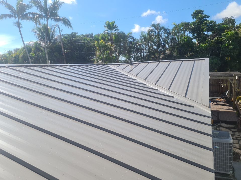 Residential Roofing Installation using 1" Nail strip metal roof by BLUES BROTHERS CONSTRUCTION CORP