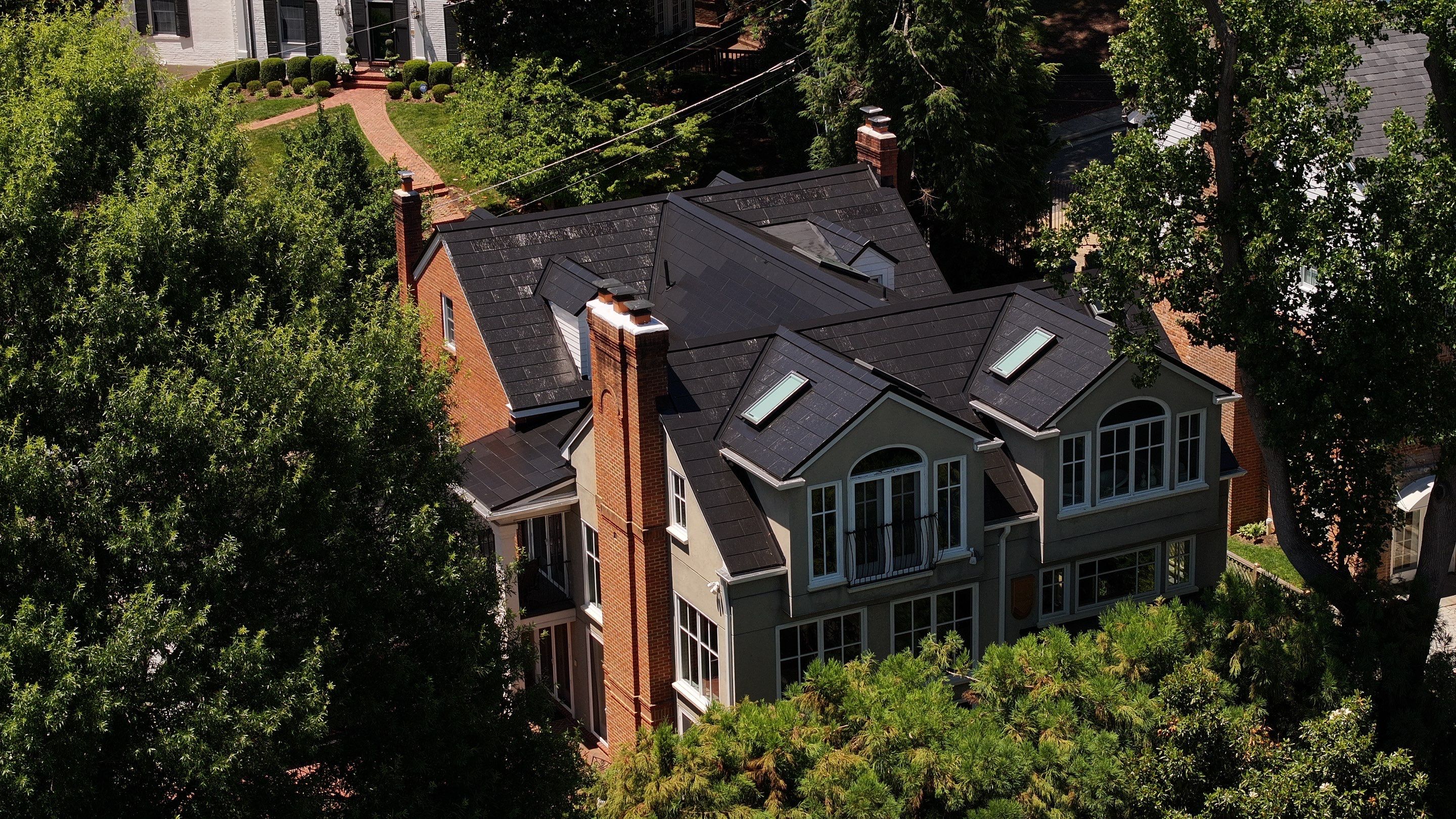 Sleek Tesla Solar Roof + Powerwall Installation | Alexandria, VA by American Home Contractors