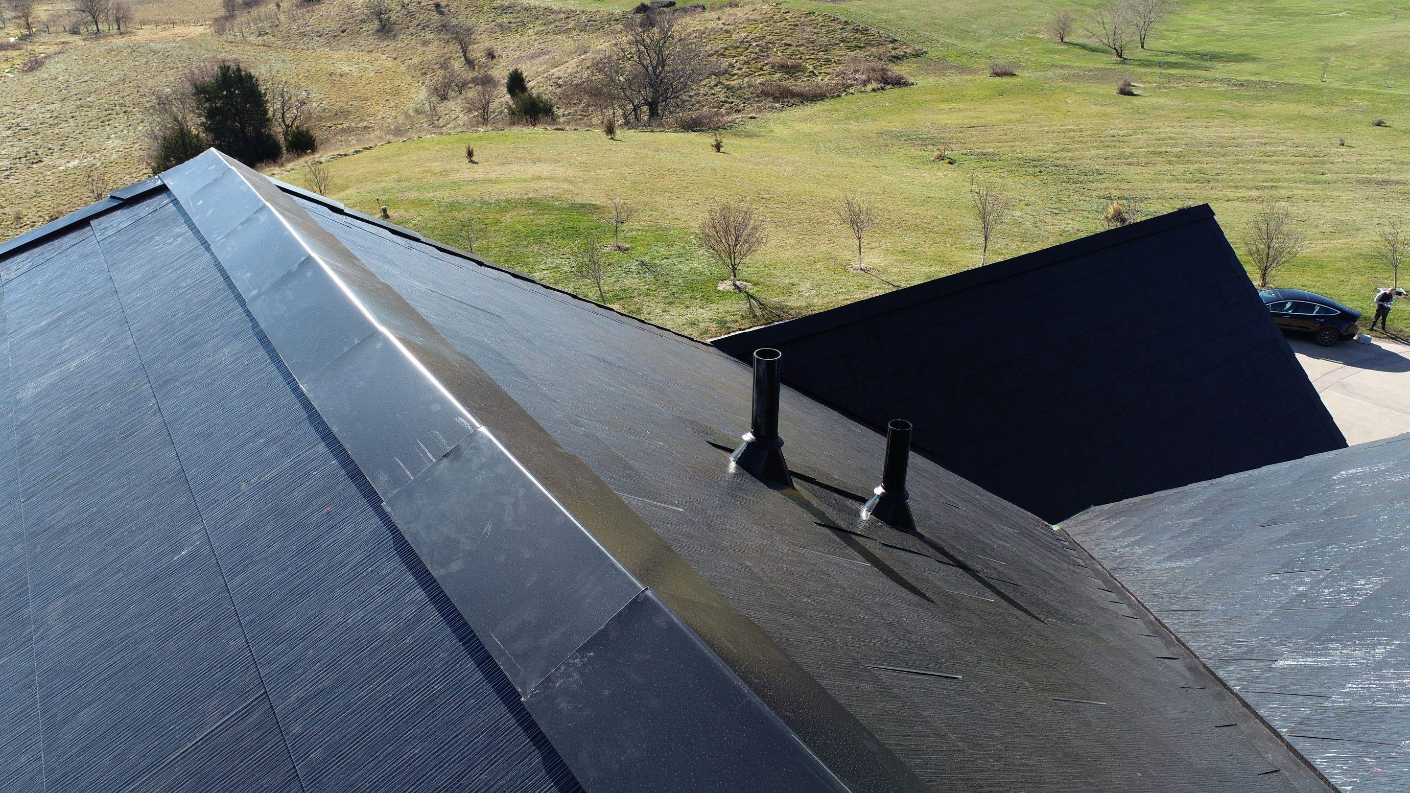 Tesla Solar Roof Replacement by American Home Contractors