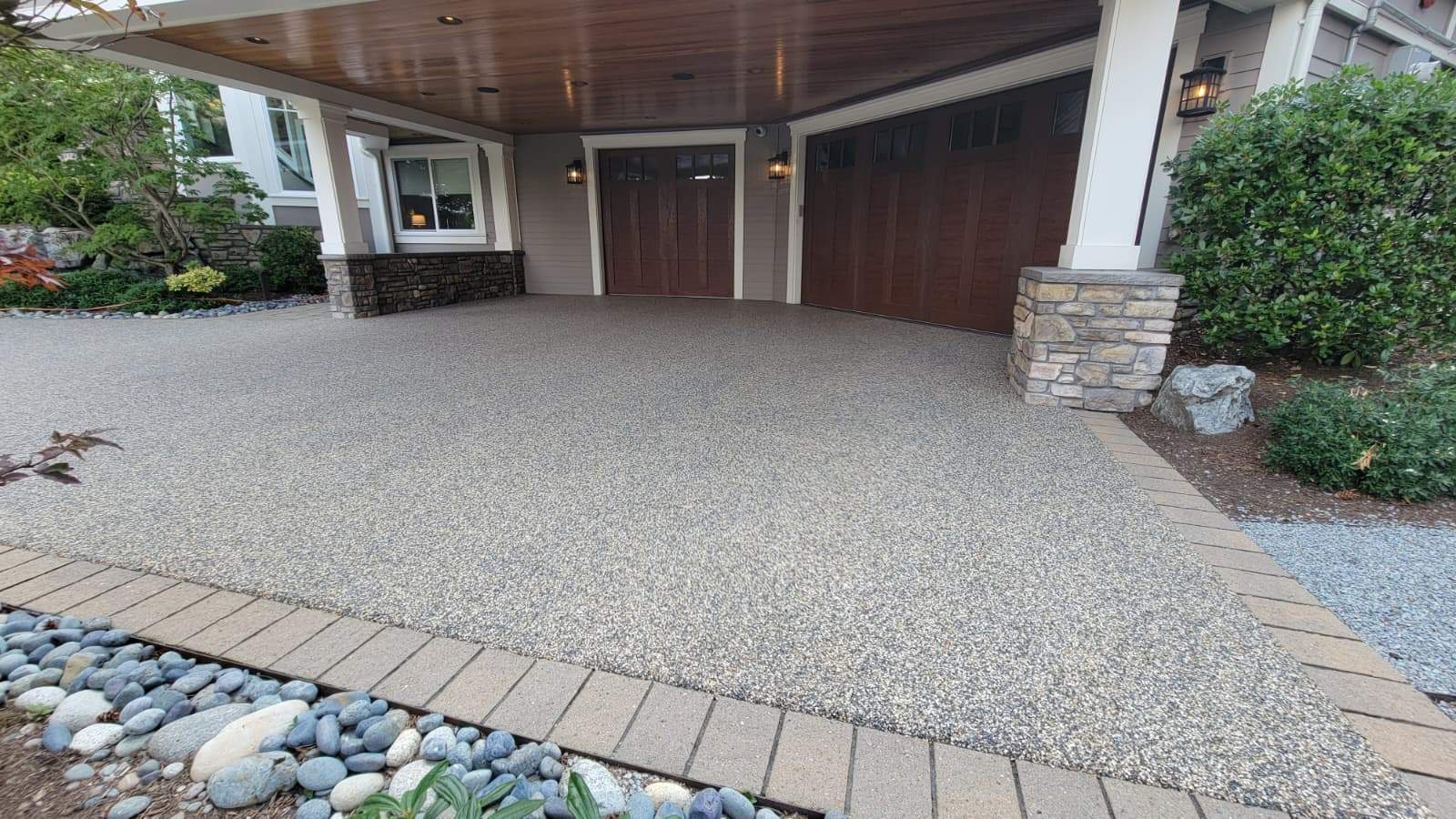 Coastal Grandeur Driveway and Patio in Big Sur Vuba Stone by Concrete Coating Experts Inc.