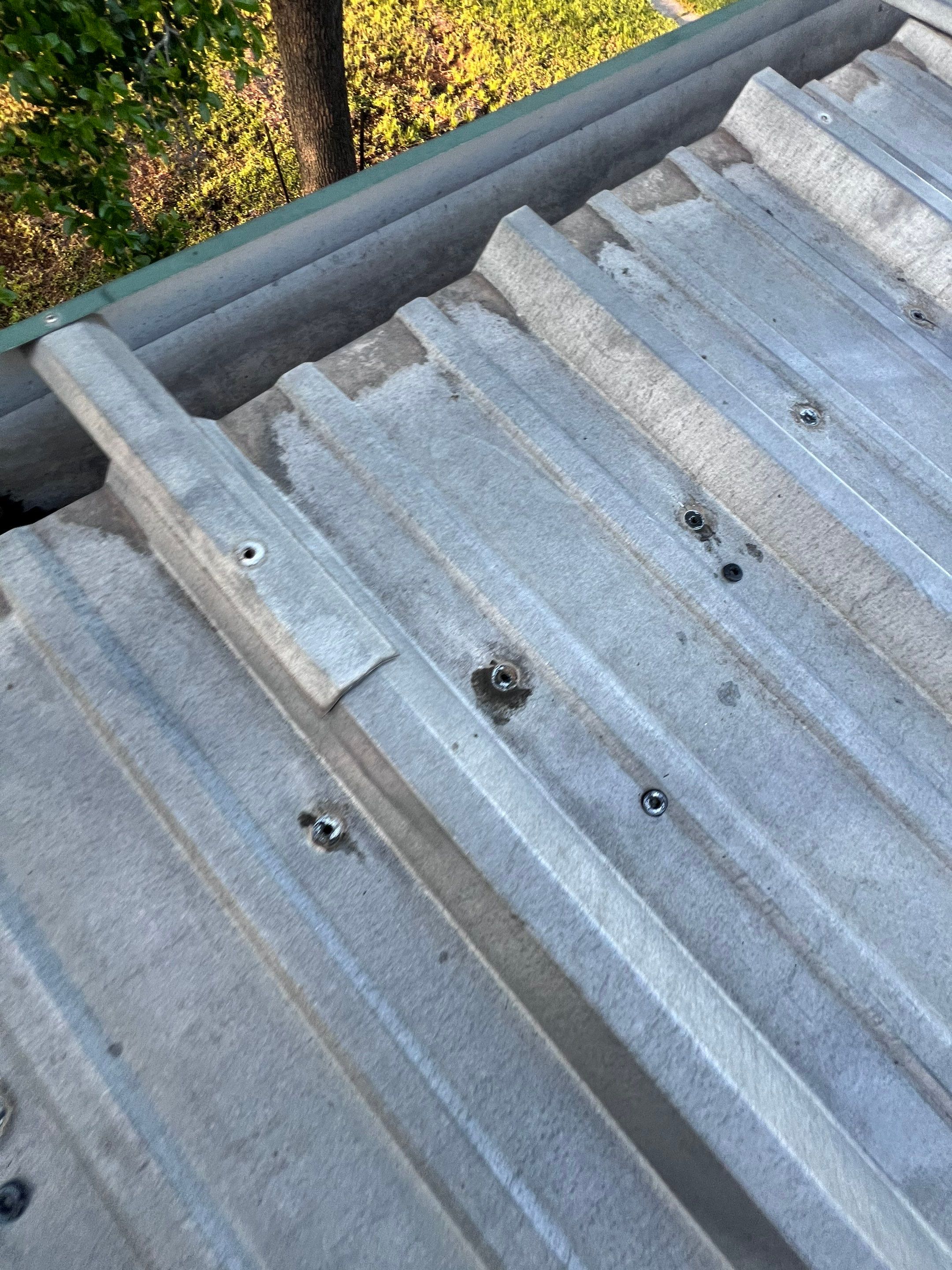 Hail Damage using Metal by Roof Repair Company