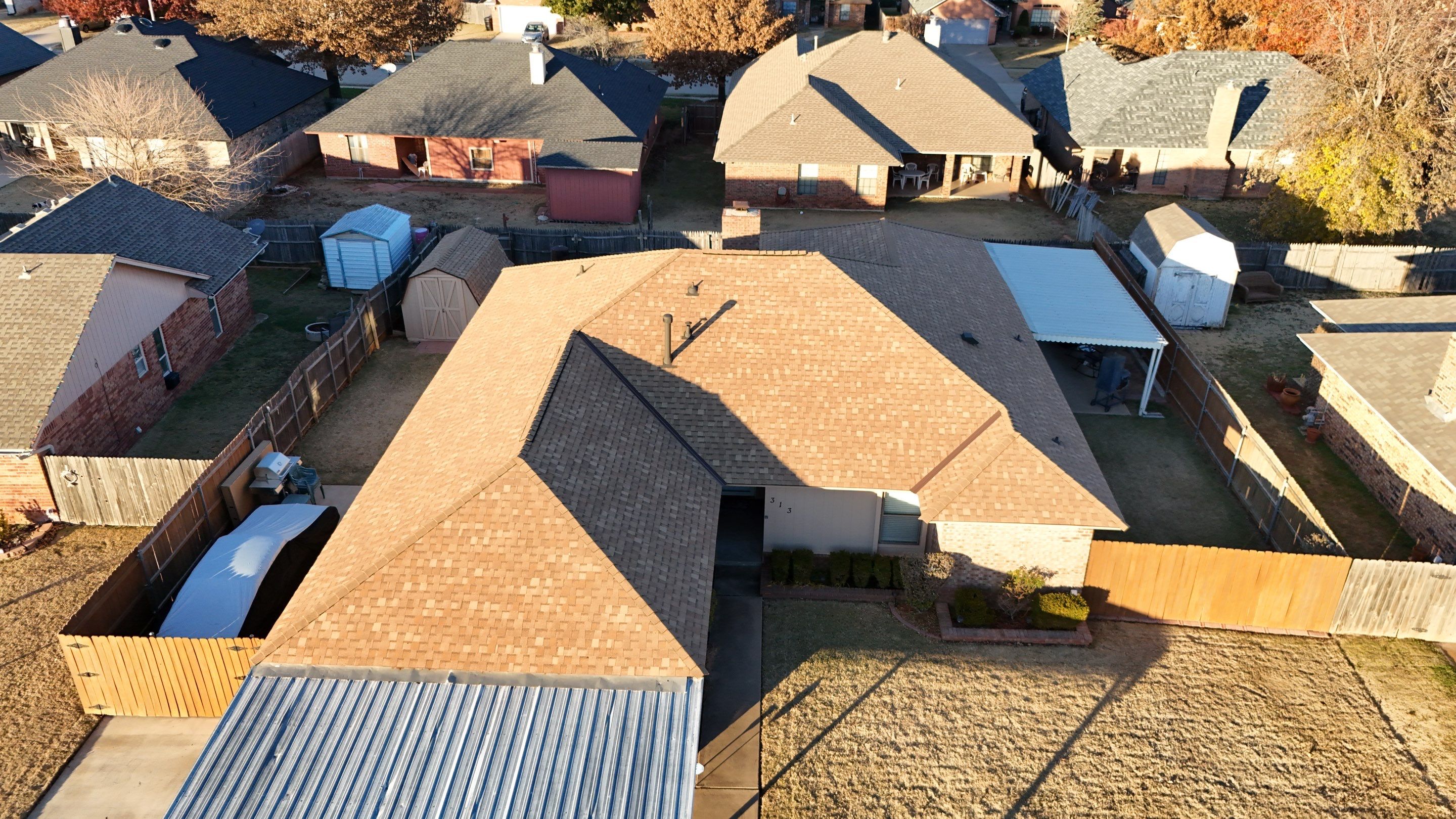 Residential Roofing Installation using titan xt rustic cedar by Thunder City Roofing