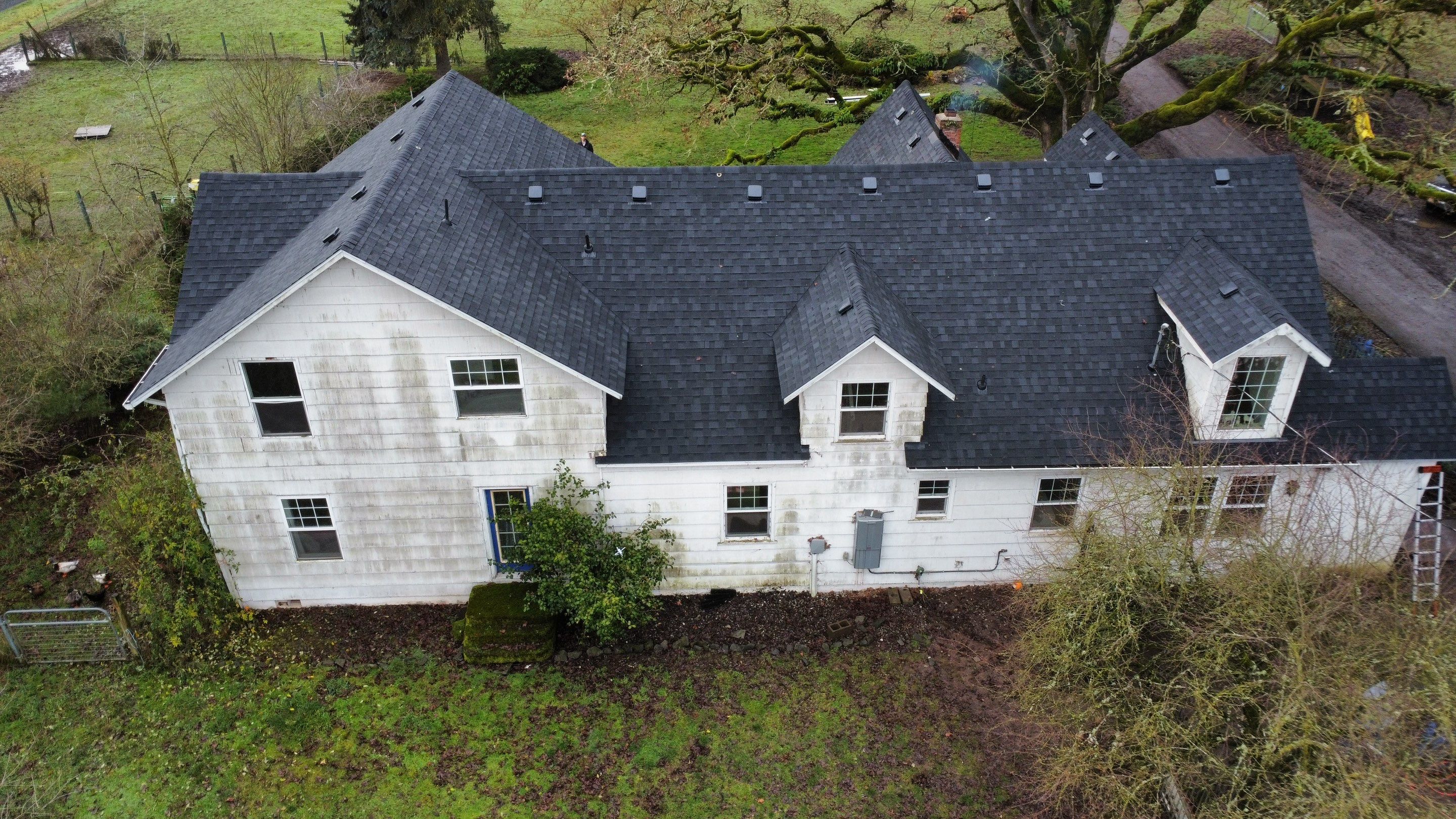 Residential Roofing Installation using IKO Dynasty (Color: Granite Black) by Orezona Building & Roofing Company, Inc.
