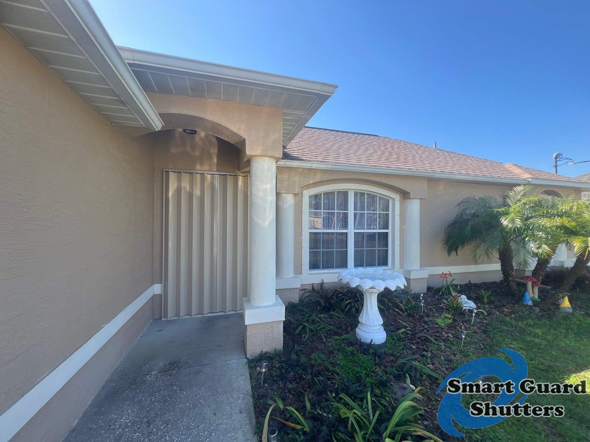 Hurricane Protection in Beige  by Smart Guard Shutters