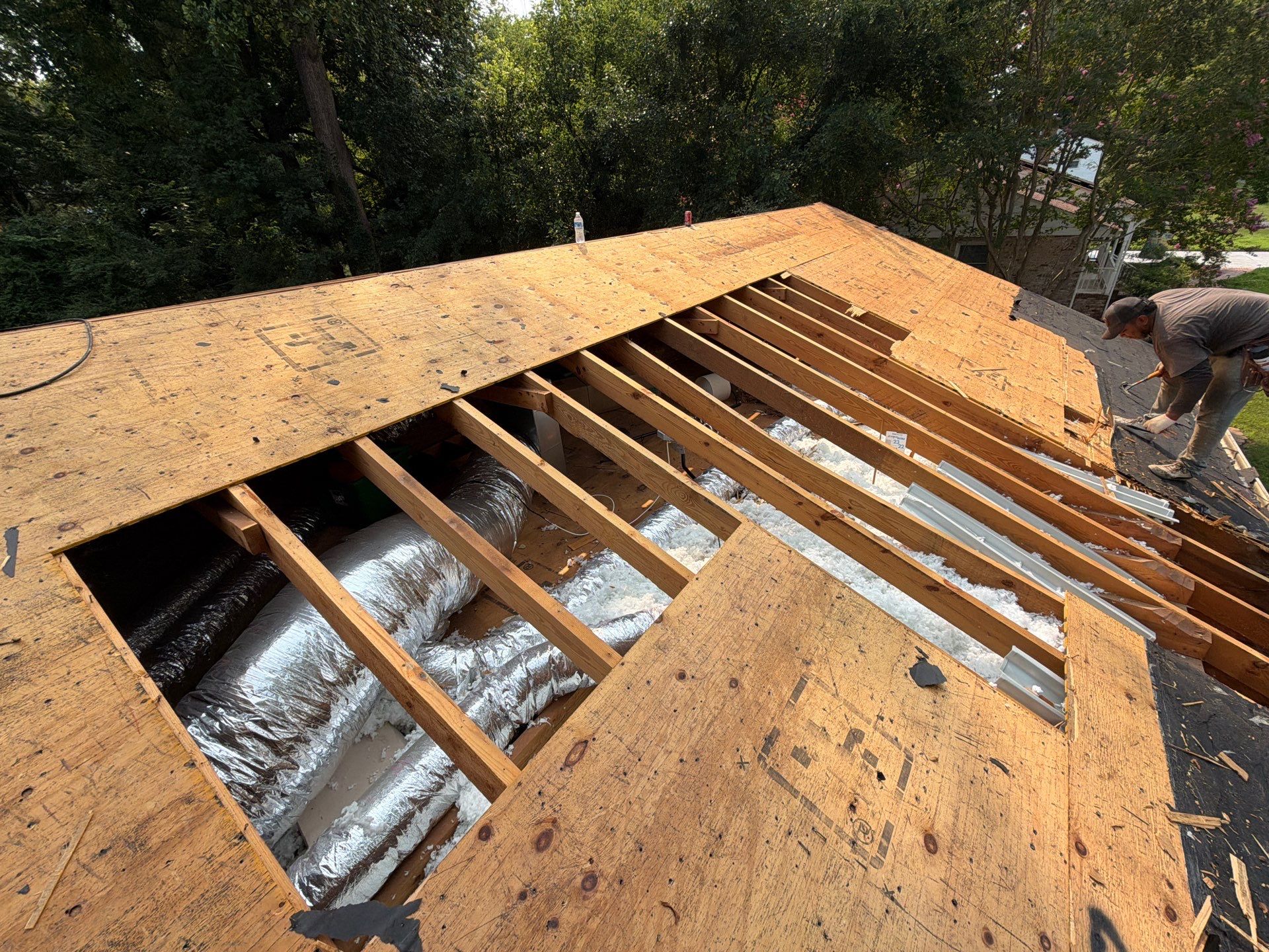 Asphalt Shingle Roof Replacement and Gutter Installation in Richmond by Cade Construction