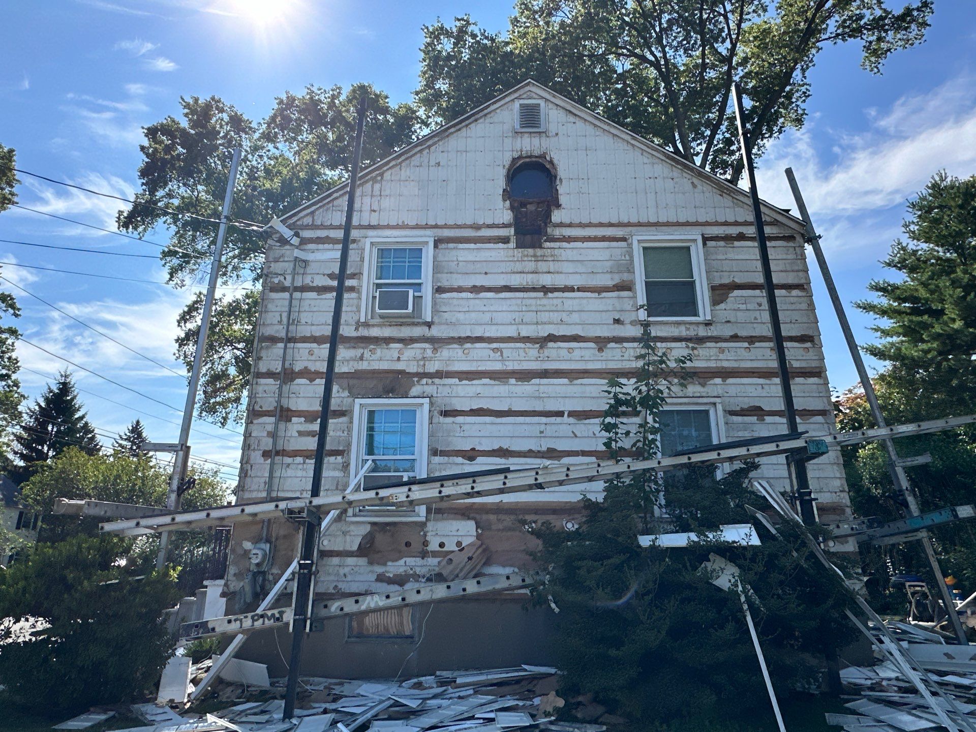 Siding Installation using CertainTeed Monogram Vinyl Siding - D4 - Forest by A Plus Exterior