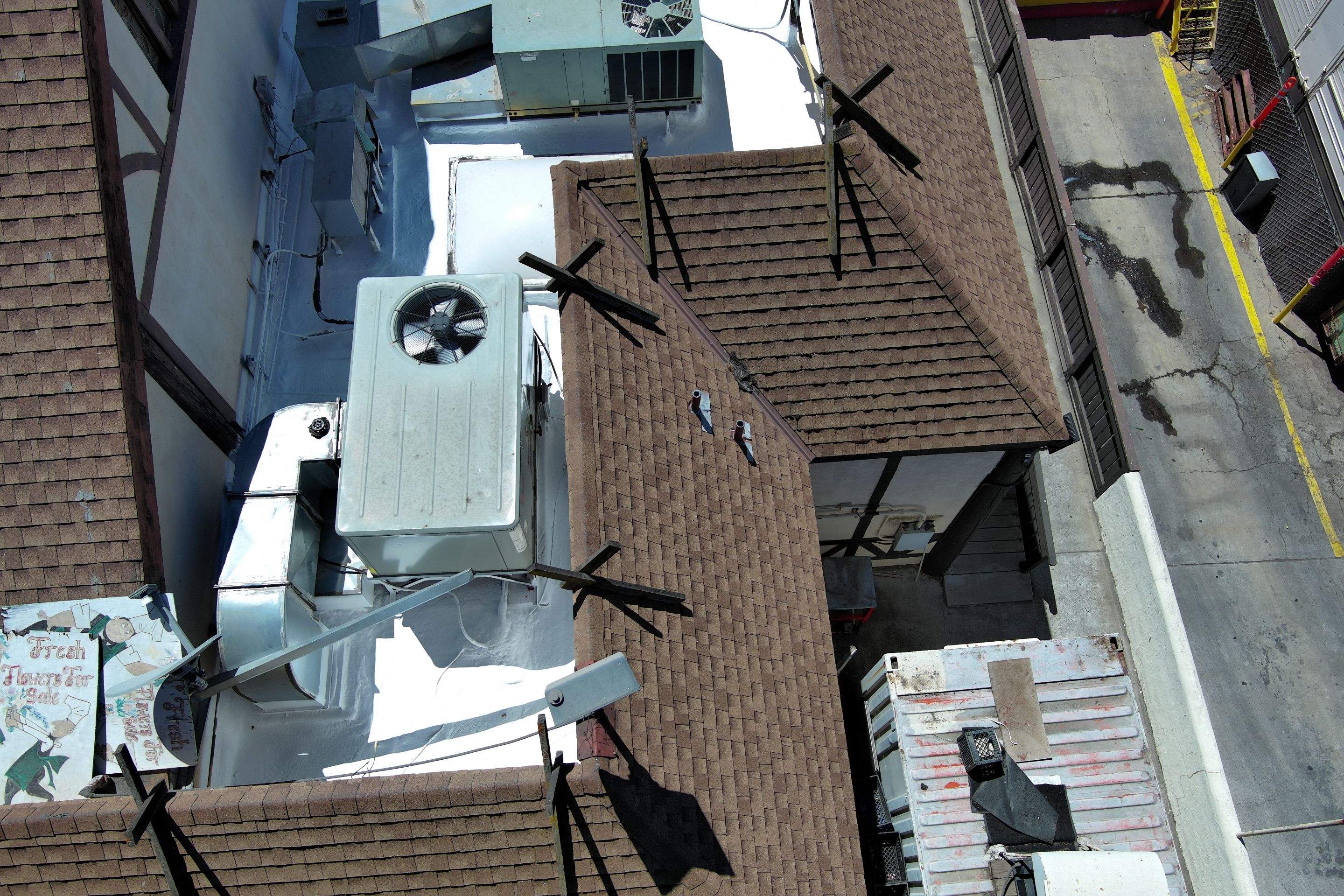 Spray foam and coatings using General Coatings acrylic coatings and spray foam by Straight Edge Roofing Inc