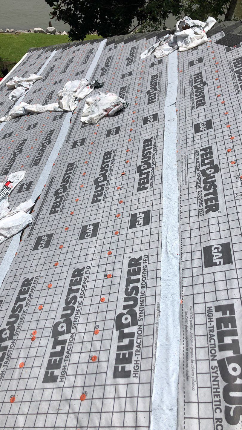 Residential Roofing Installation using Roof Replacement by American Roofing & Construction LLC